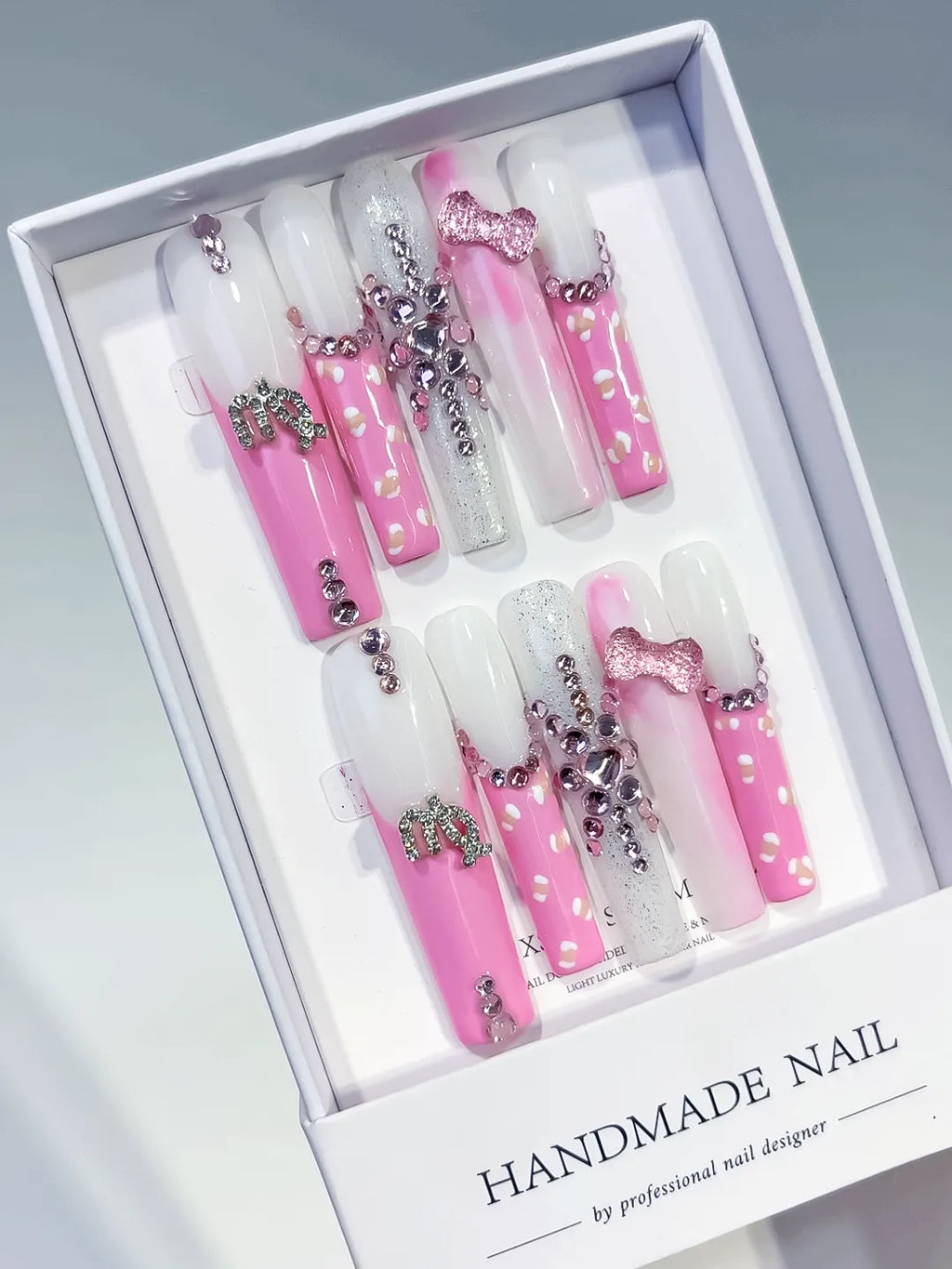Pink White Silver Solid color Bow Heart Rhinestone press on nails angled view