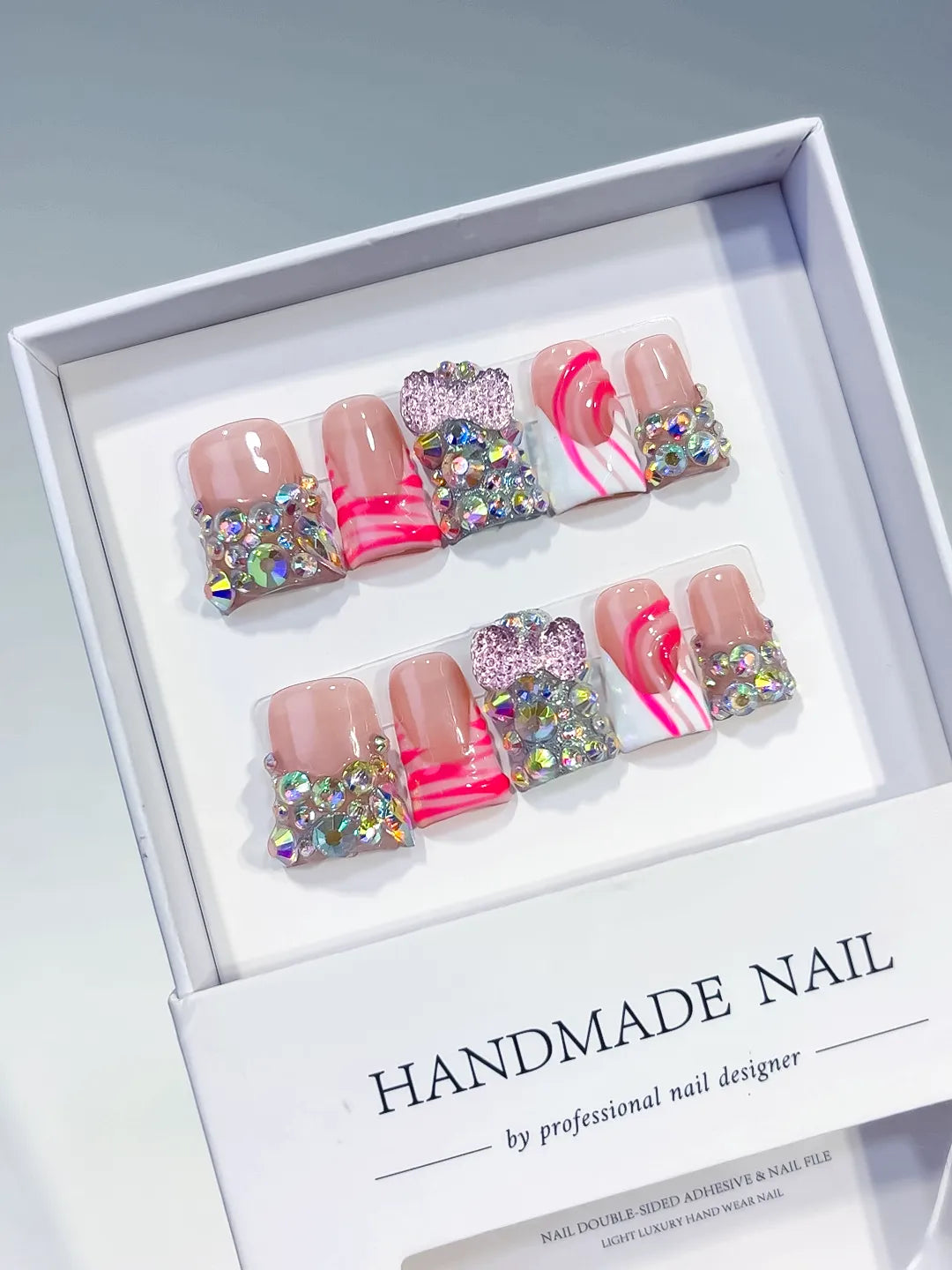 Nude White Pink Silver Abstract Heart Rhinestone press on nails angled view