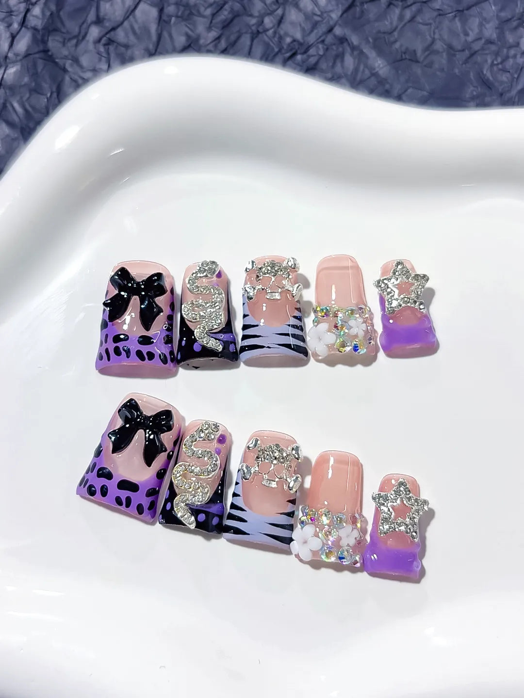 Nude Purple Black White Silver Abstract Bow Snake Star Flower Rhinestone press on nails detail view