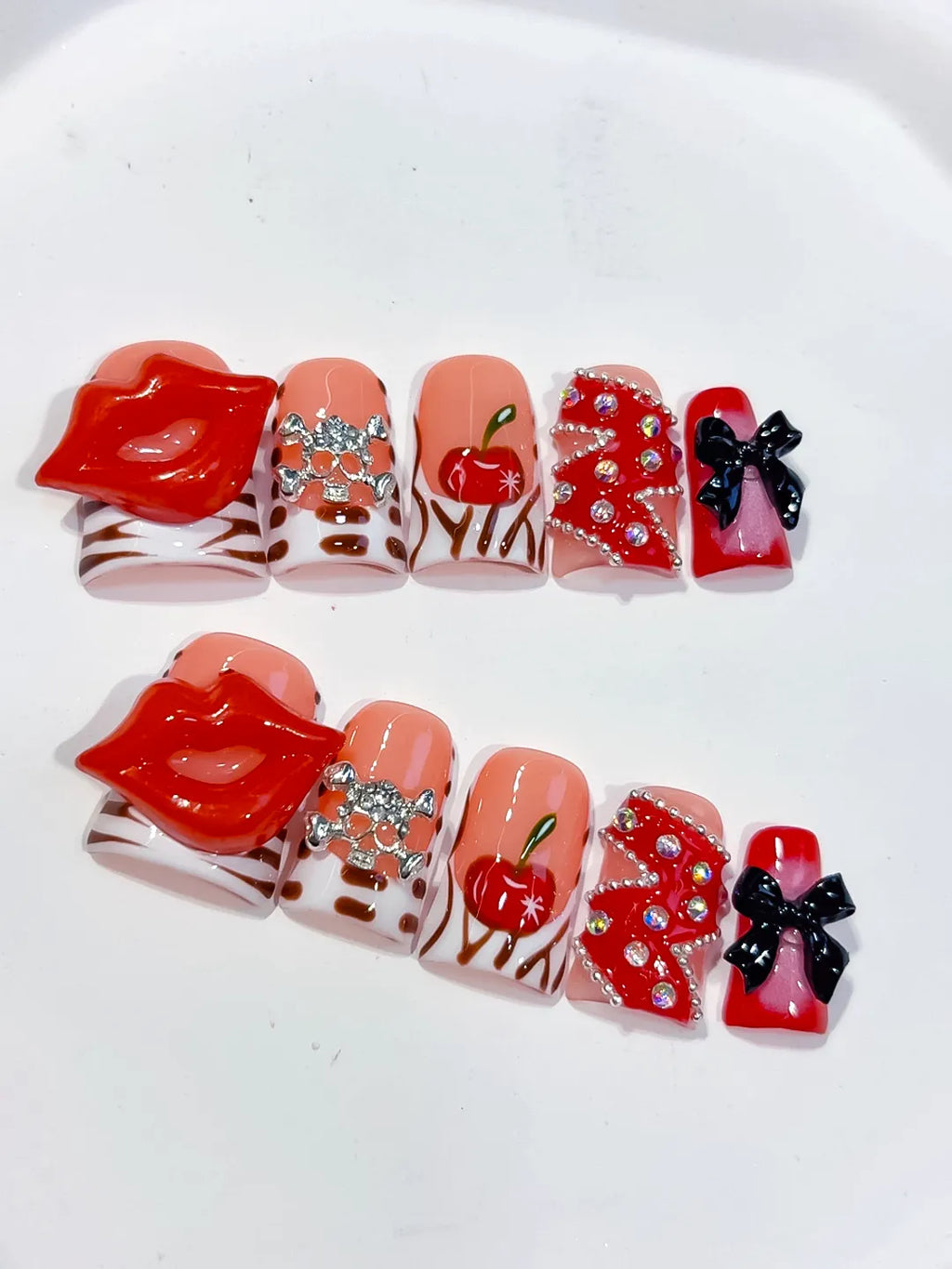 Nude Red Pink White Black Silver Abstract Lip Apple Bow Rhinestone 3D press on nails detail view