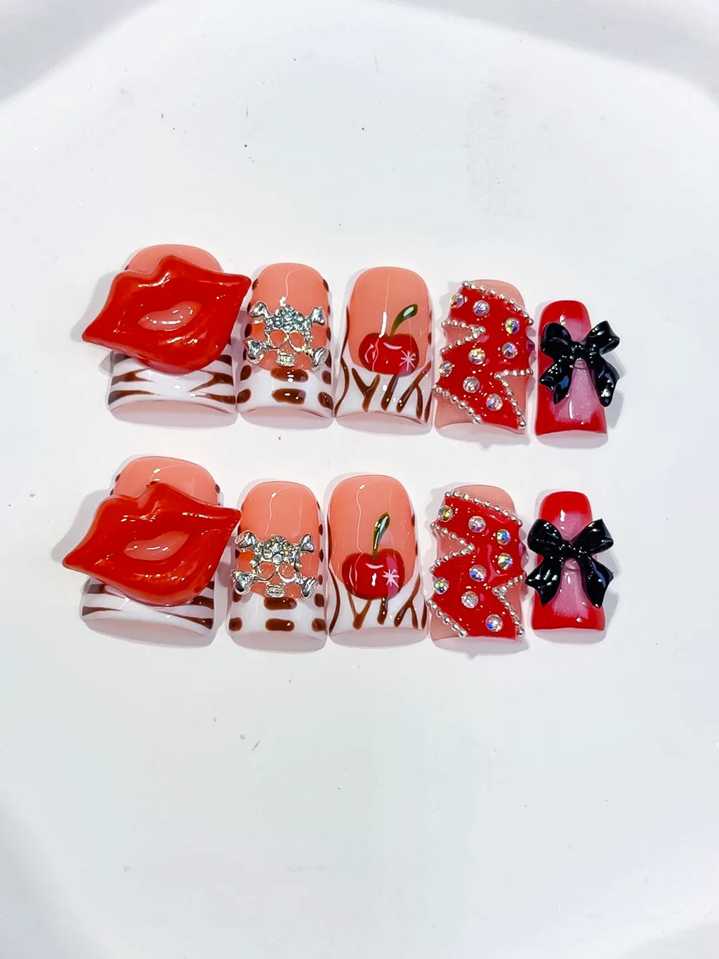 Nude Red Pink White Black Silver Abstract Lip Apple Bow Rhinestone 3D press on nails detail view