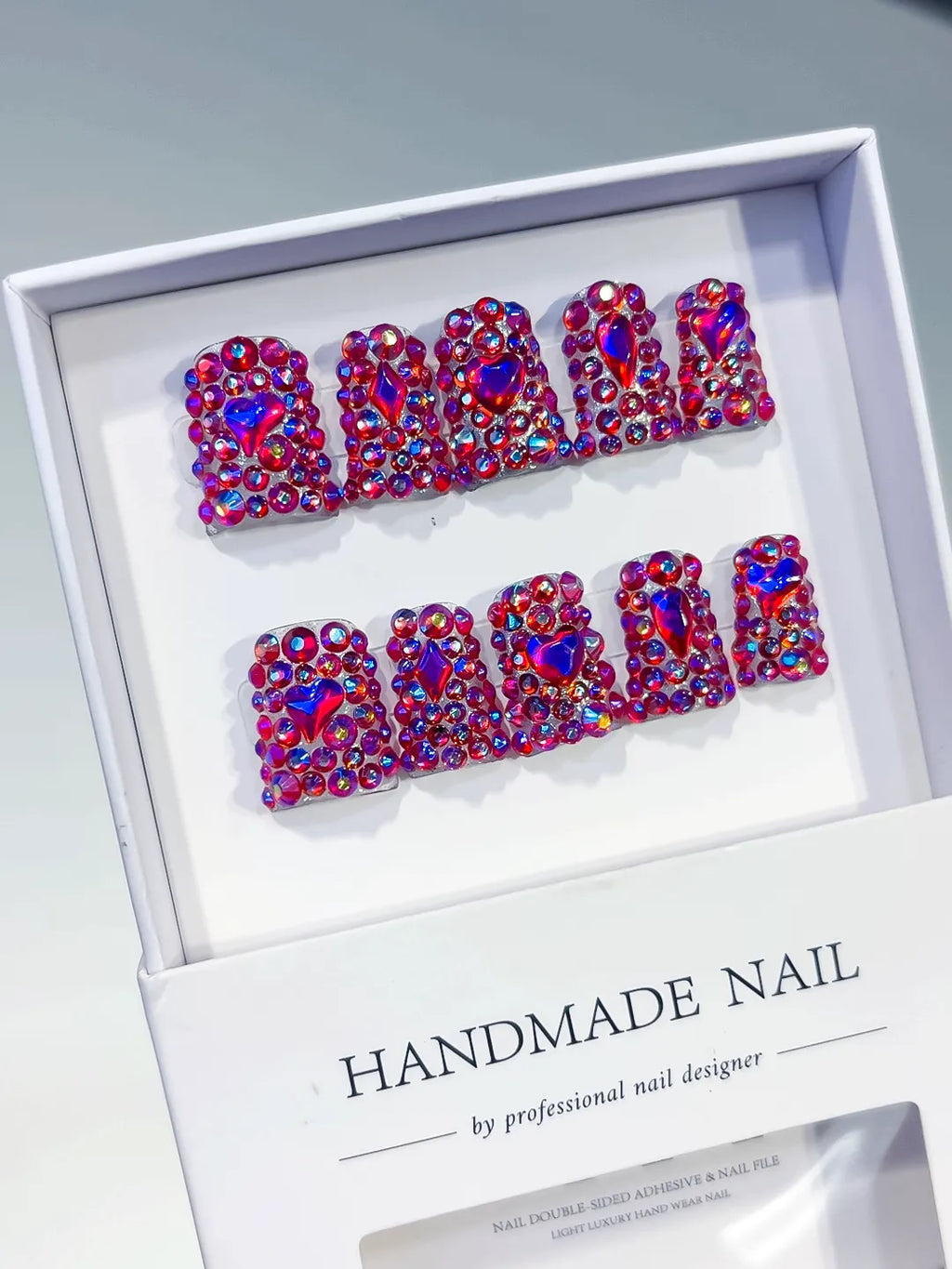 Pink Multicolor Glitter press on nails angled view