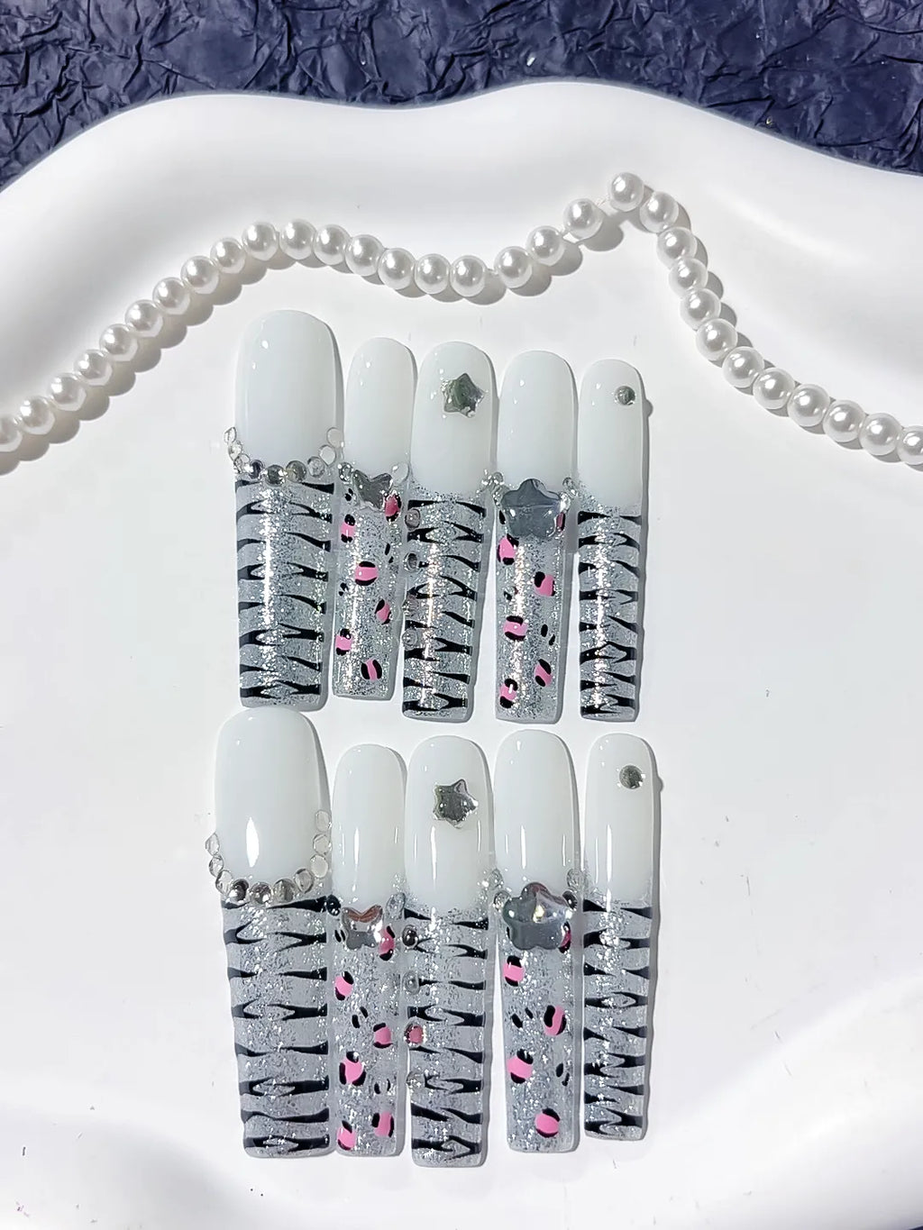 White Silver Black Pink Abstract Star Animal Print Rhinestone press on nails close up