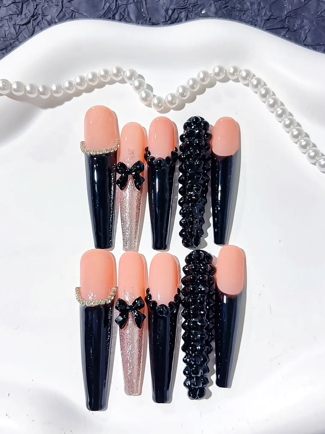 Nude Black Pink Gold French tip Bow Glitter 3D press on nails detail view