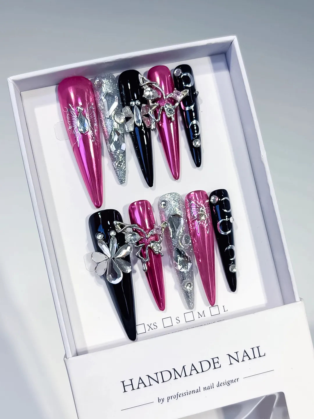 Pink Black Silver Metallic Flower Rhinestone 3D press on nails angled view
