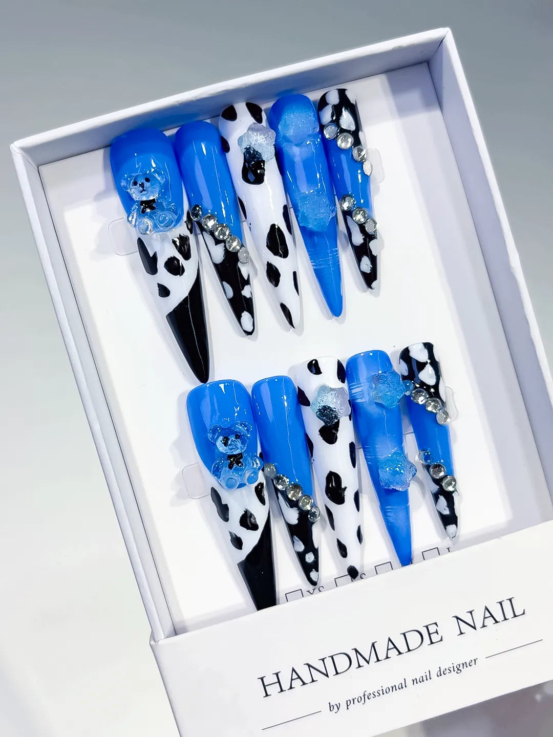 Blue Black White Silver Abstract Animal Print Flower Rhinestone 3D press on nails angled view