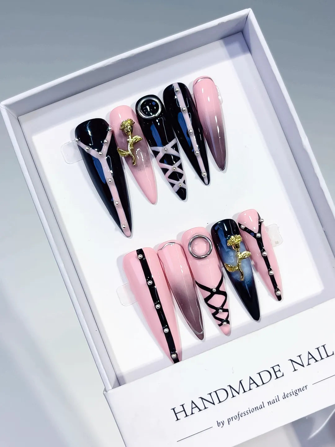 Pink Black Silver Gold Abstract Rose Lattice Piercing Rhinestone press on nails angled view