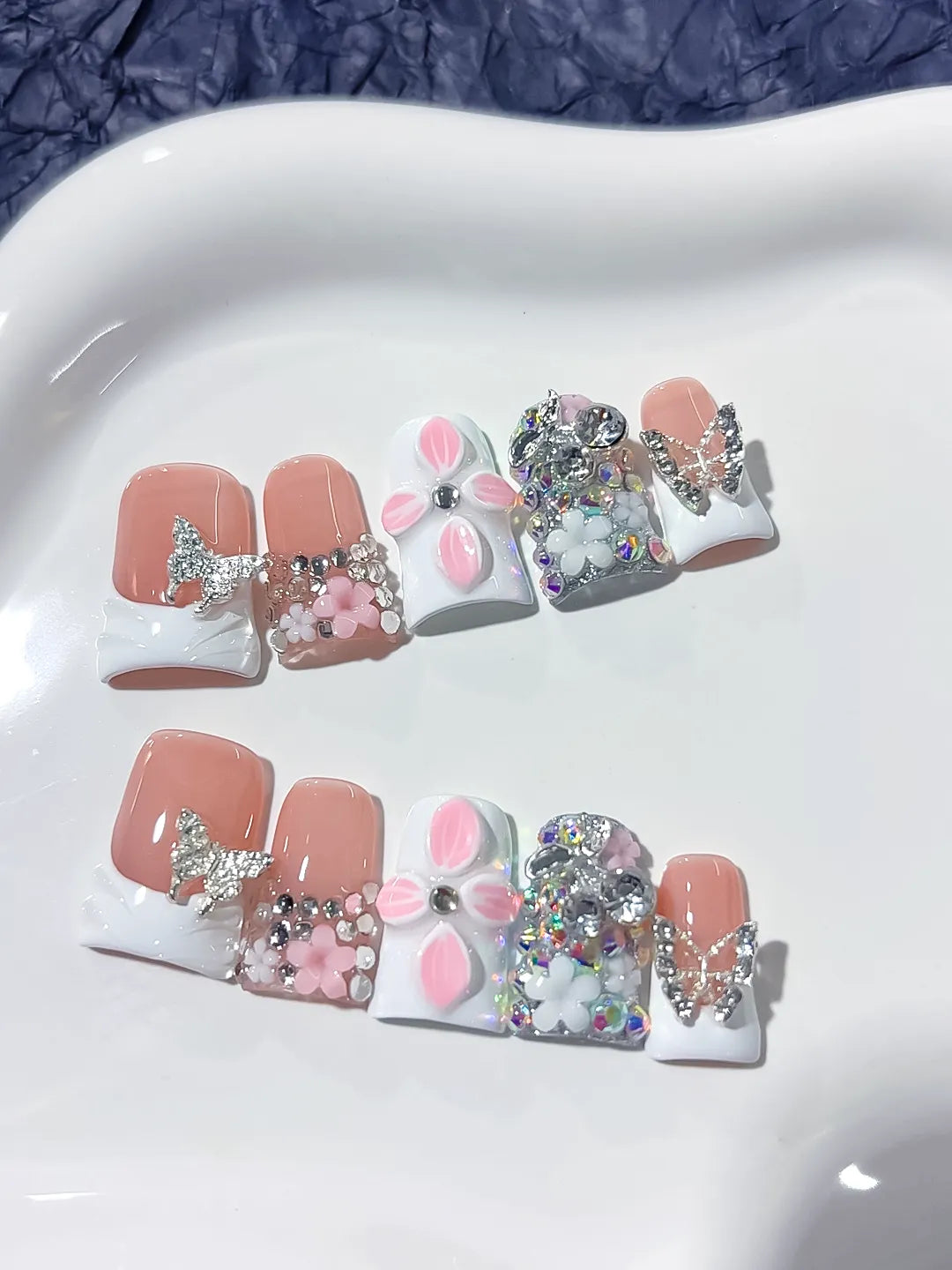 Nude White Pink Silver French tip Butterfly Flower Rhinestone 3D press on nails detail view