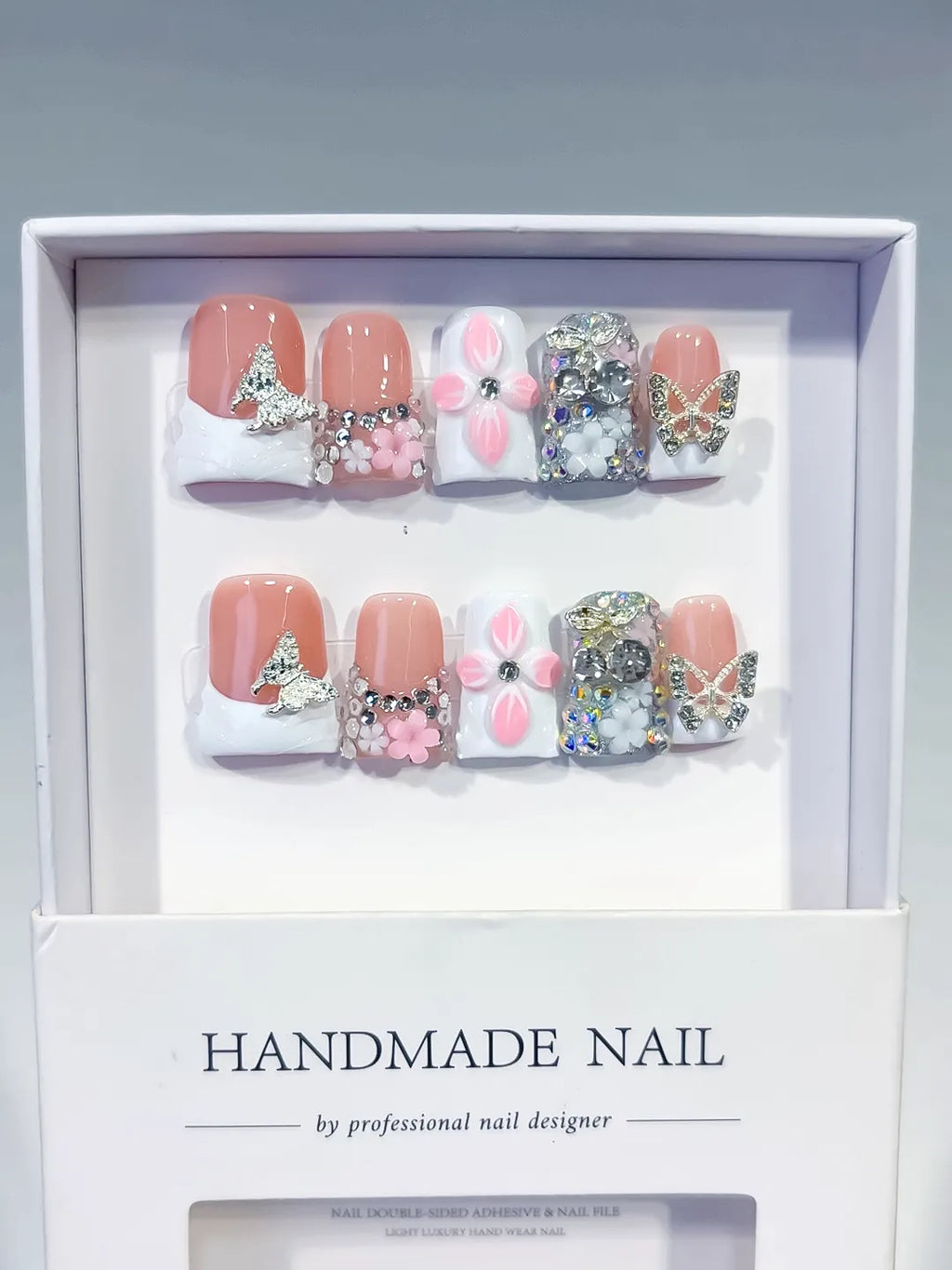 Nude White Pink Silver French tip Butterfly Flower Rhinestone 3D press on nails full set view