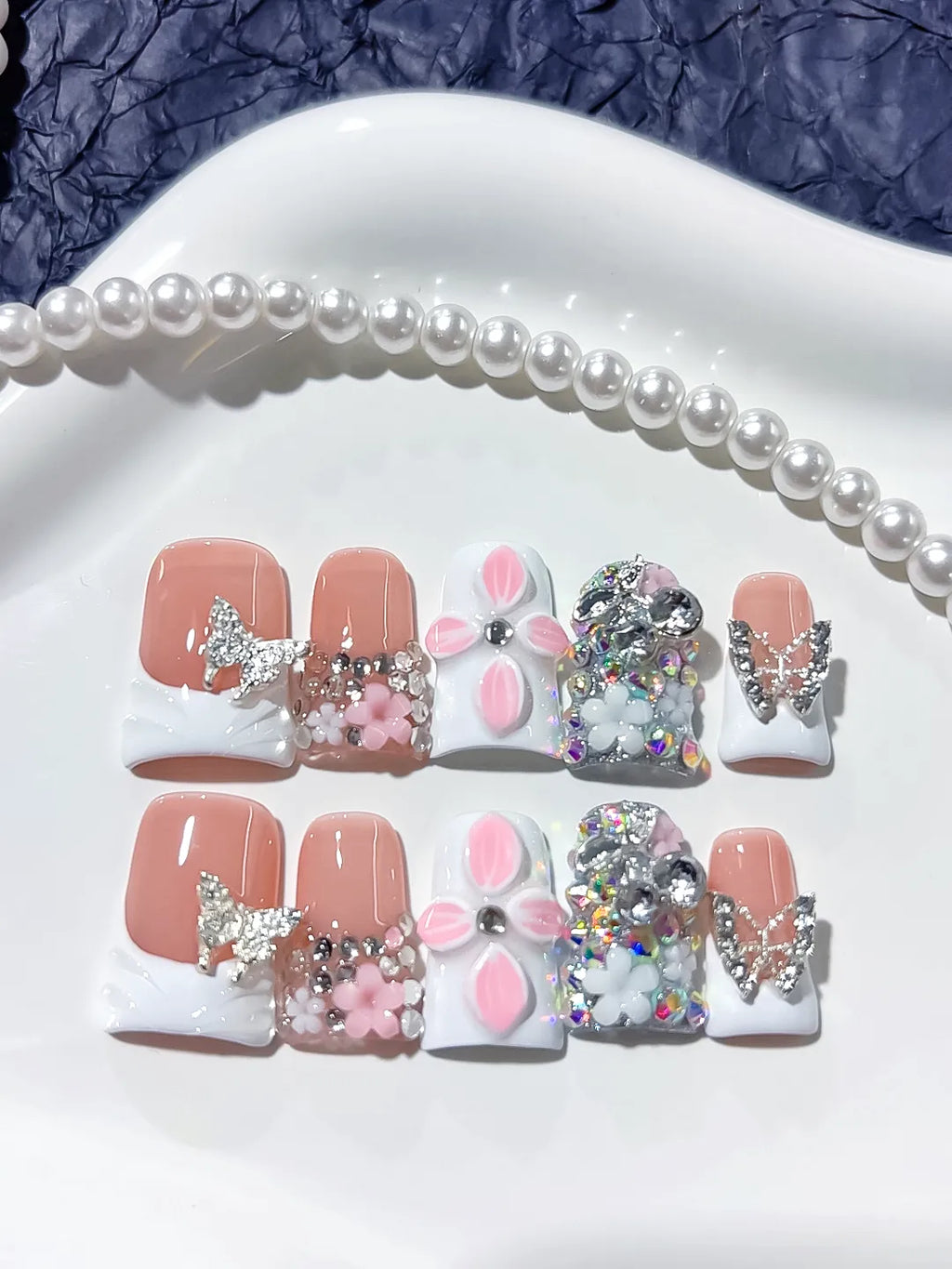 Nude White Pink Silver French tip Butterfly Flower Rhinestone 3D press on nails detail view