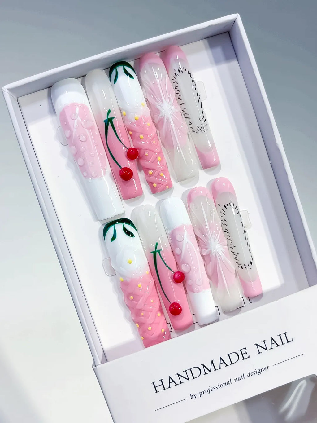 Pink White Green Black Abstract Cherry Floral press on nails angled view