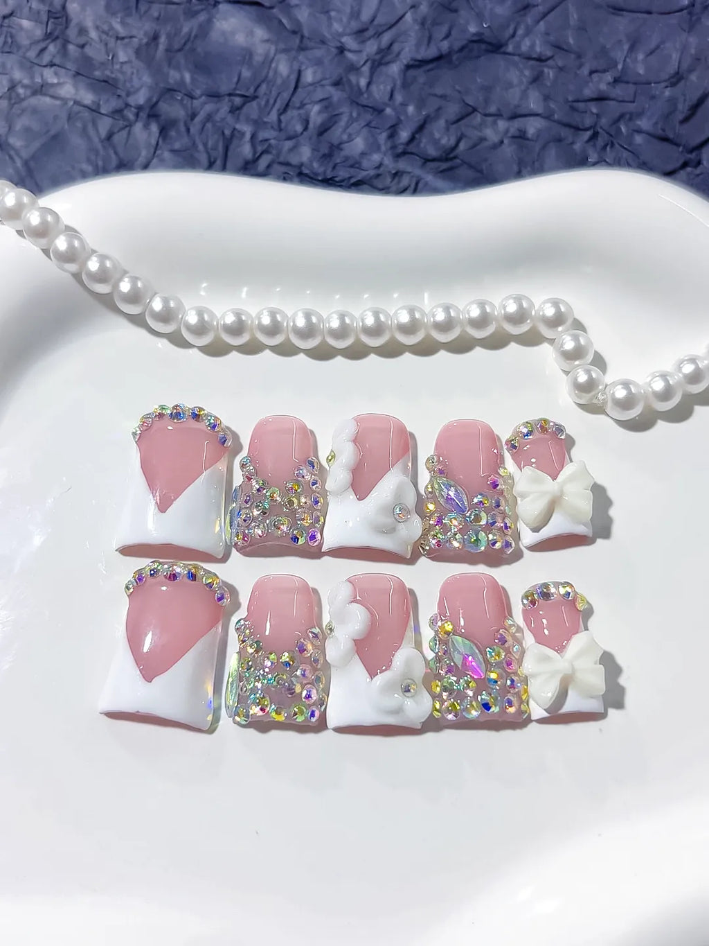 Nude Pink Silver Multicolor Glitter Heart 3D press on nails angled view