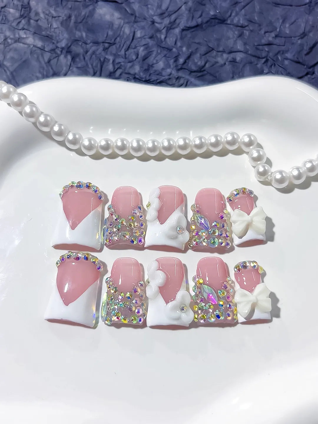 Nude Pink Silver Multicolor Glitter Heart 3D press on nails angled view