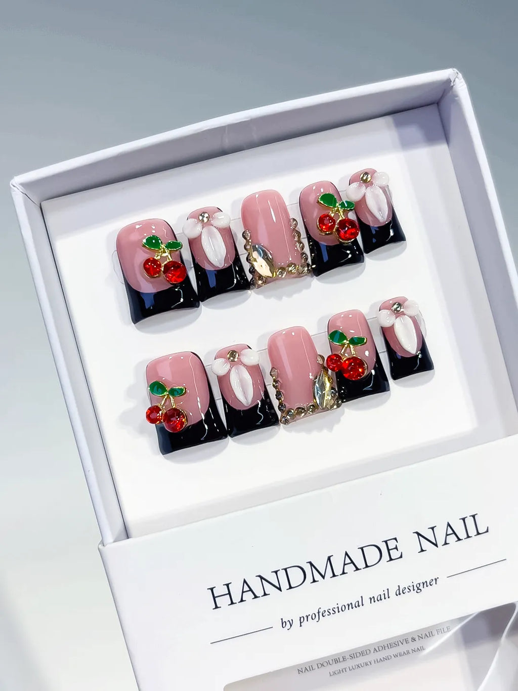 Pink Black White Red Green Abstract Cherry Floral press on nails angled view
