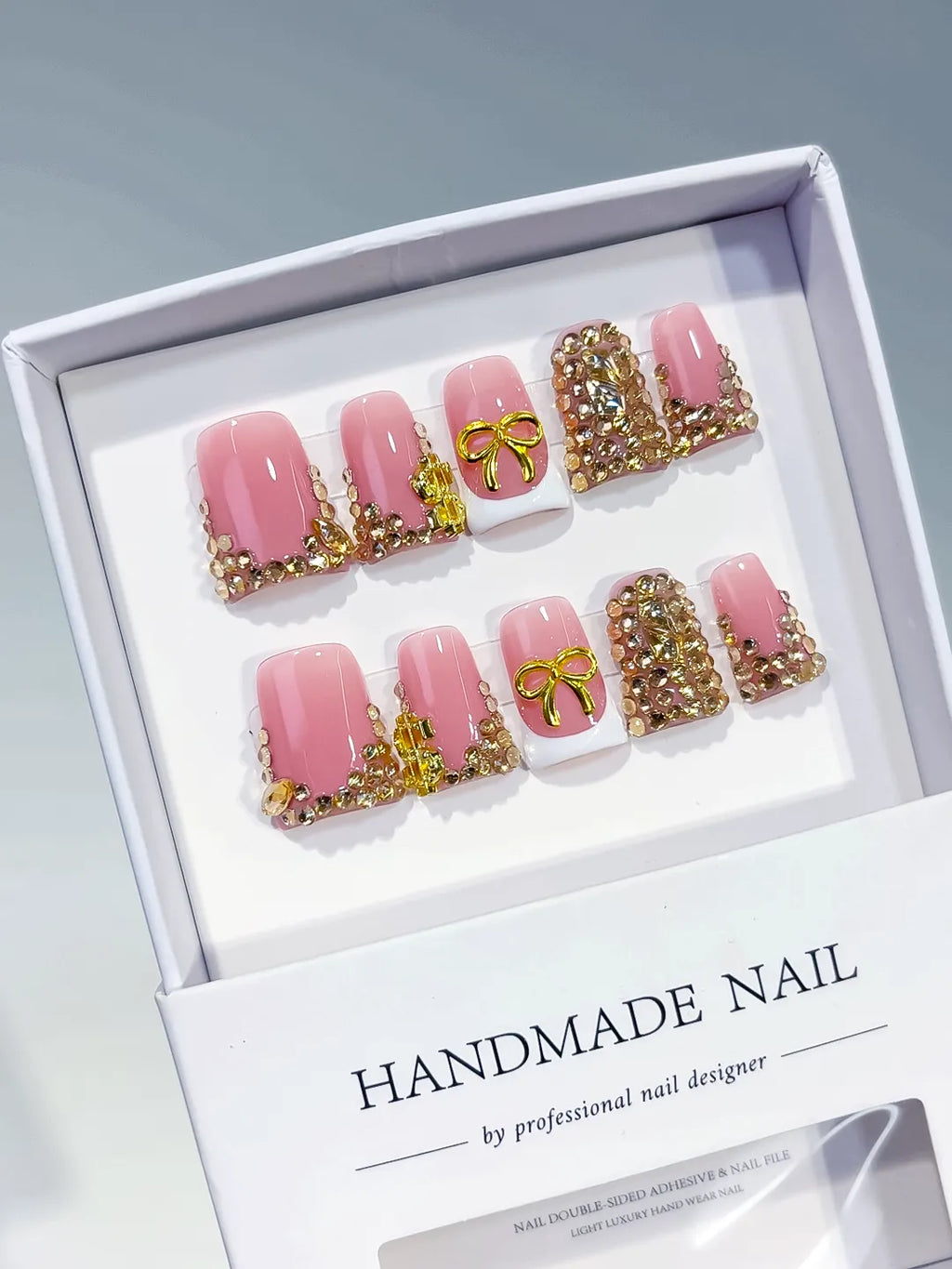 Pink White Gold Glitter Bow press on nails angled view