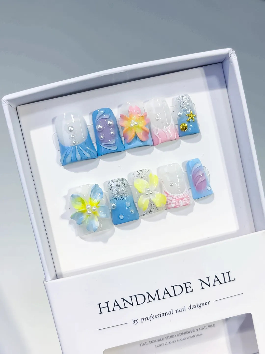 Blue White Yellow Pink Silver Abstract Flower Glitter Pearl 3D press on nails angled view