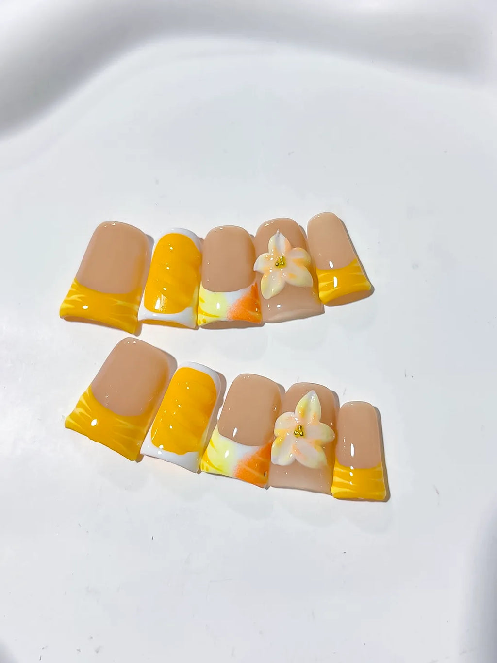 Nude Yellow White French tip Flower press on nails detail view