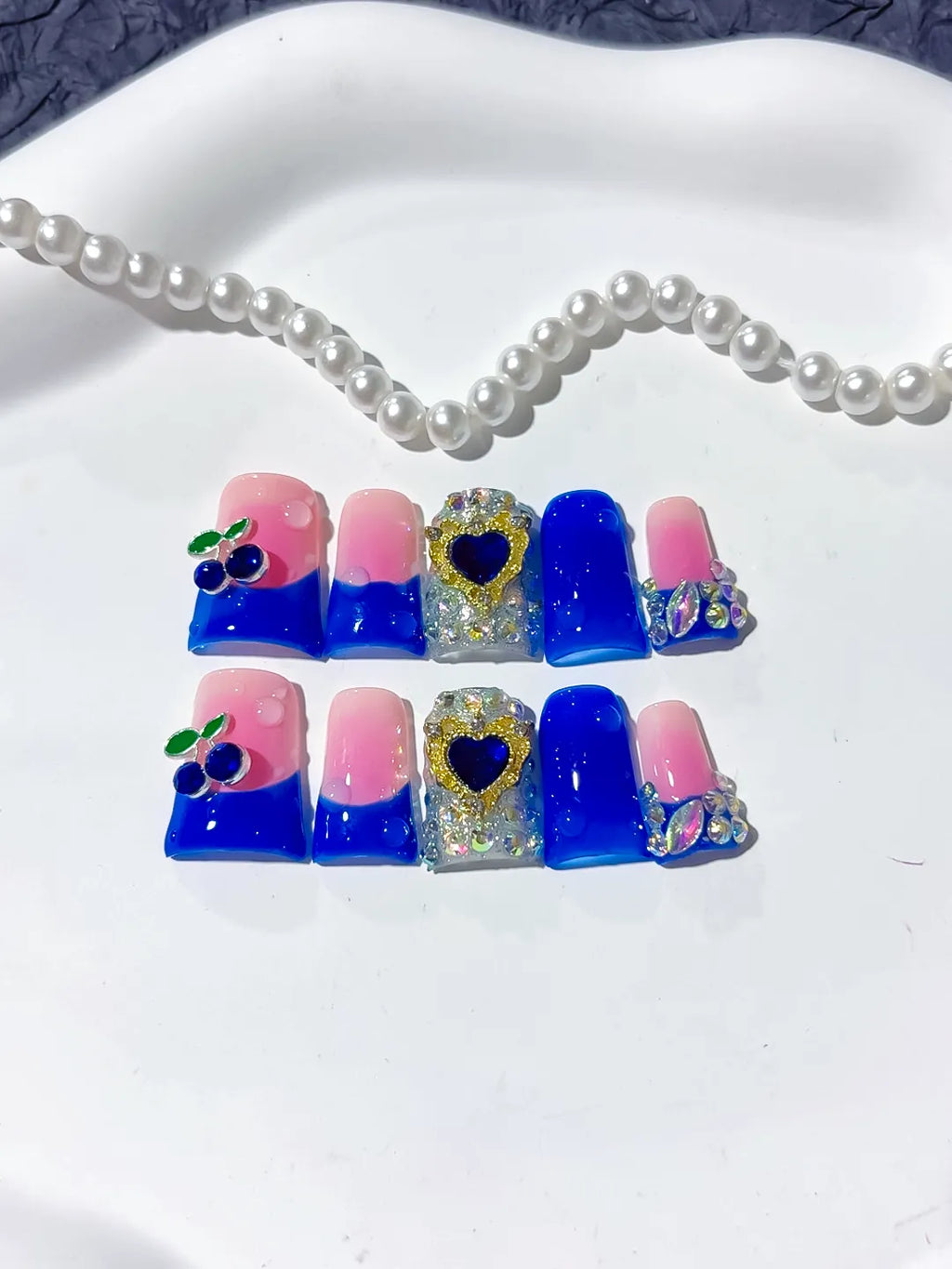 Pink Blue Purple Silver Ombre Heart Rhinestone press on nails close up
