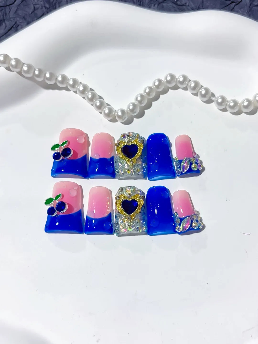 Pink Blue Purple Silver Ombre Heart Rhinestone press on nails close up