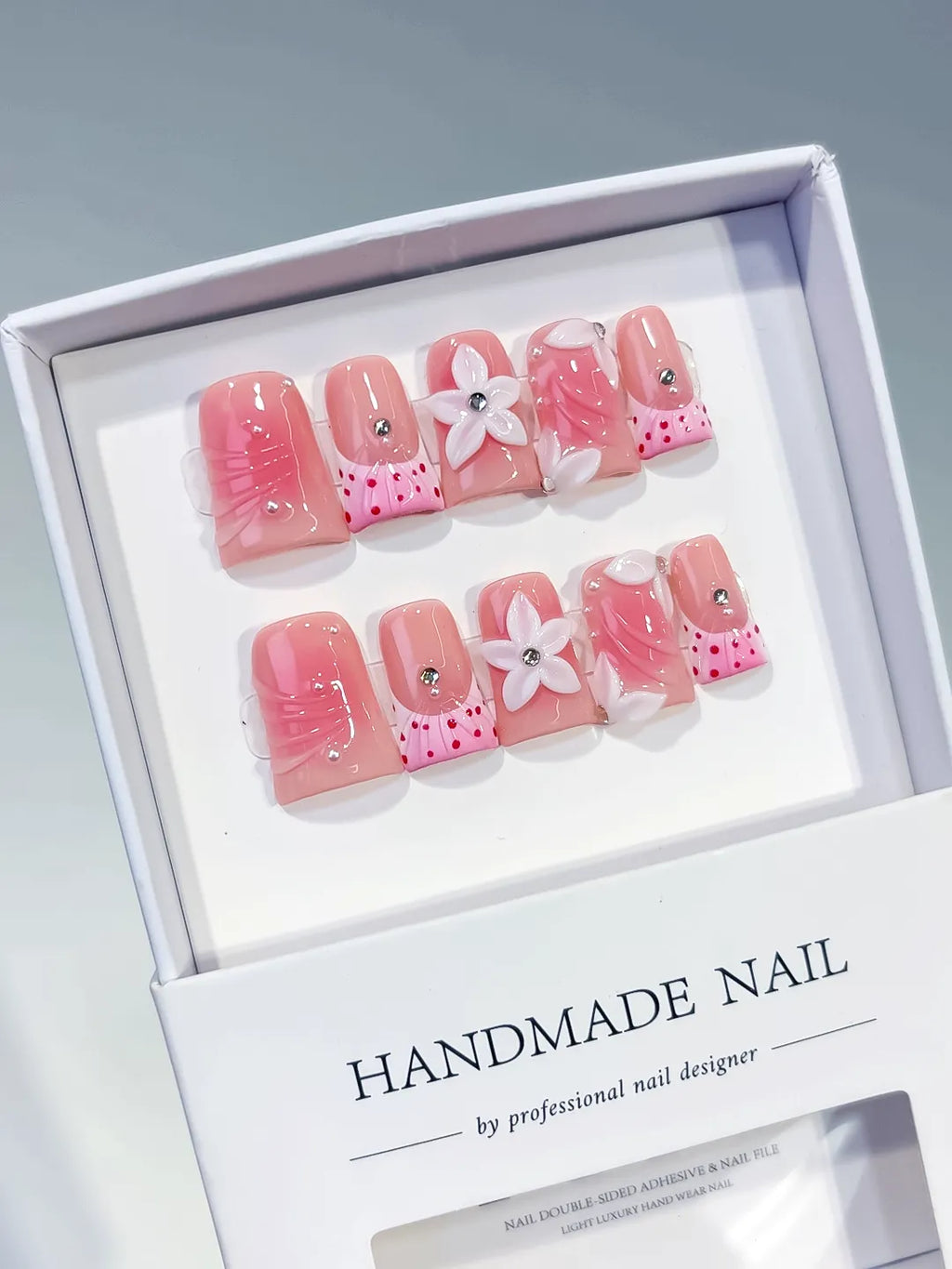Pink White Silver Abstract Bow Heart Flower Rhinestone 3D press on nails angled view