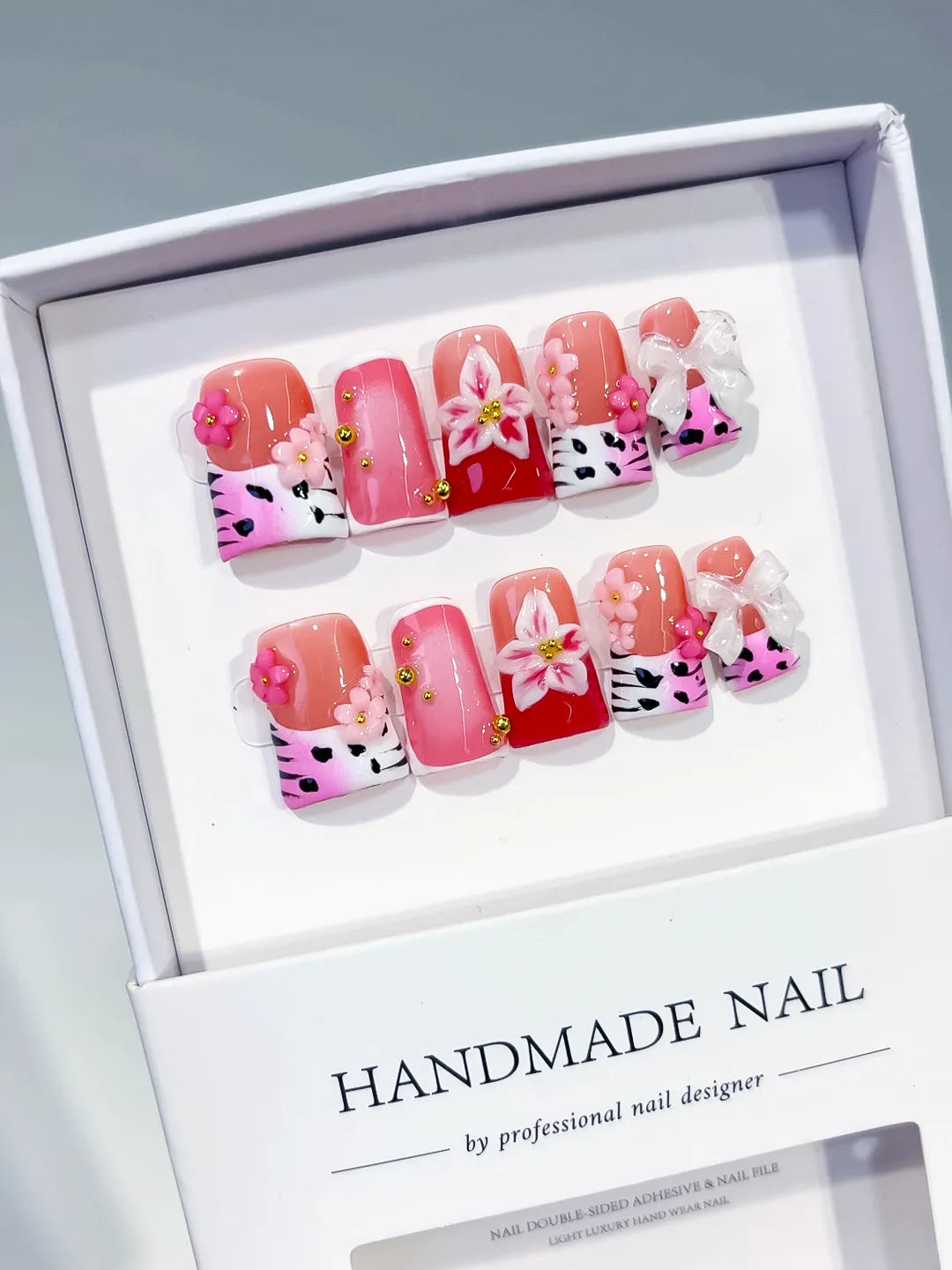 Pink White Red Silver Abstract Heart Hello Kitty Bow Rhinestone 3D press on nails angled view