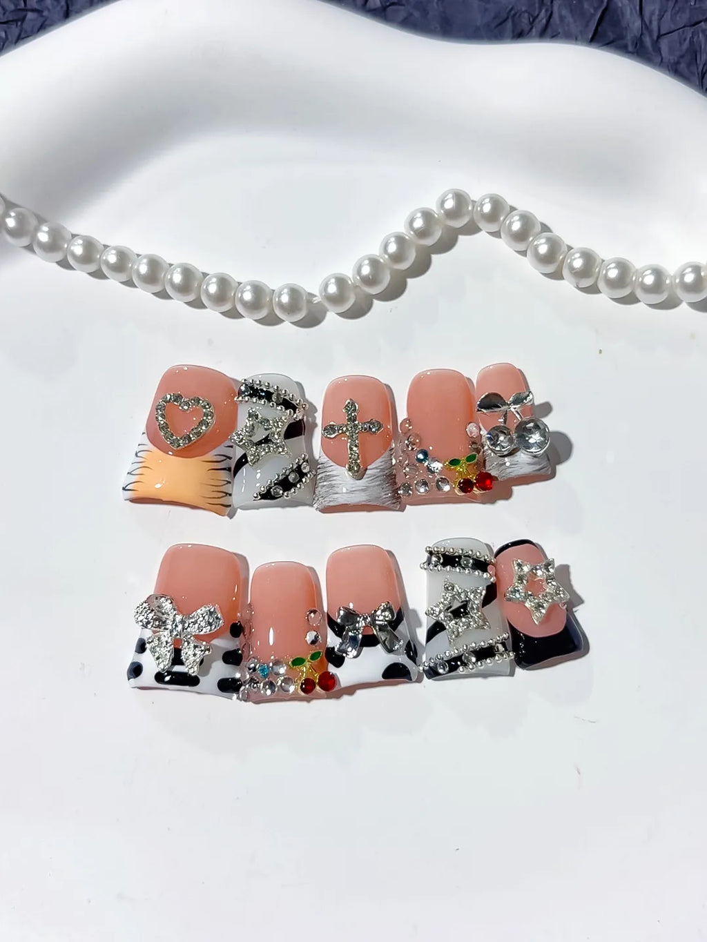 Nude Black White Silver Abstract Bow Heart Cross Cherry Rhinestone press on nails detail view