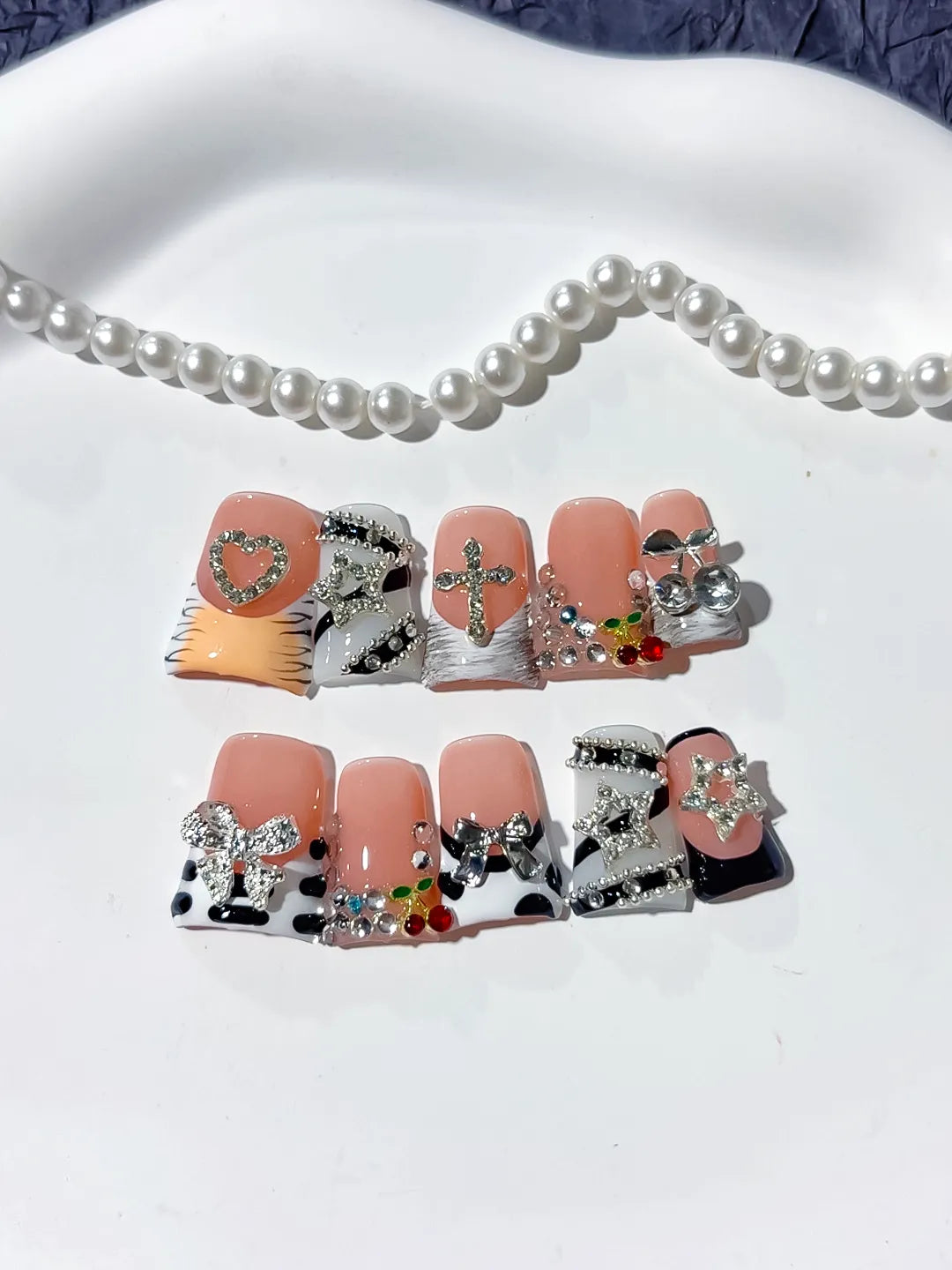 Nude Black White Silver Abstract Bow Heart Cross Cherry Rhinestone press on nails detail view