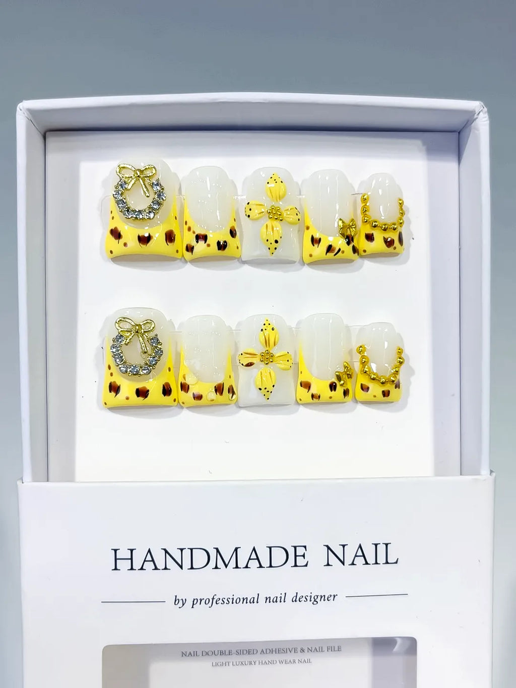 Yellow White Gold Black French tip Bow Heart Rhinestone press on nails full set view