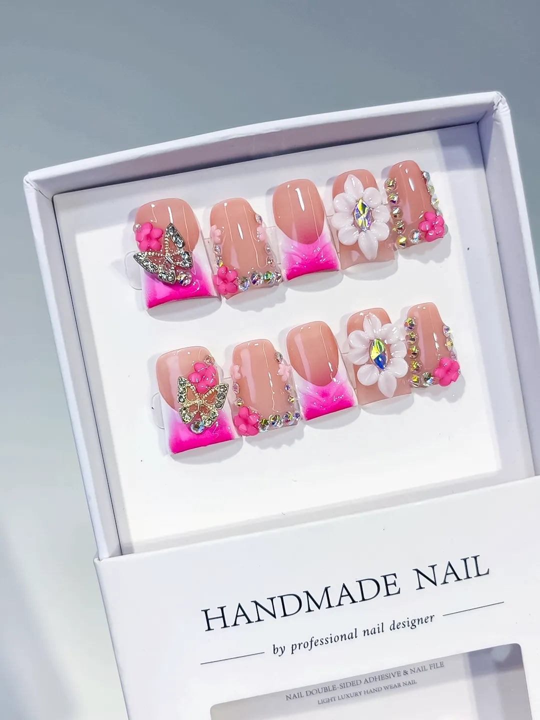 Nude Pink Gold Silver Abstract Flower Butterfly Rhinestone press on nails angled view