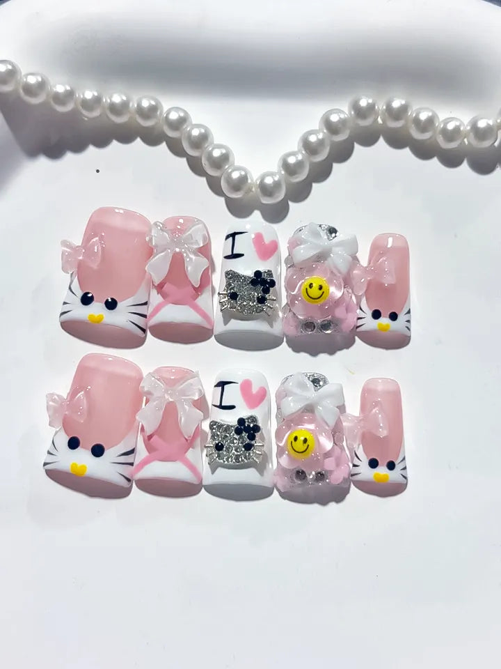 Pink White Black Silver Abstract Bow Smile Text Hello Kitty Rhinestone 3D press on nails close up