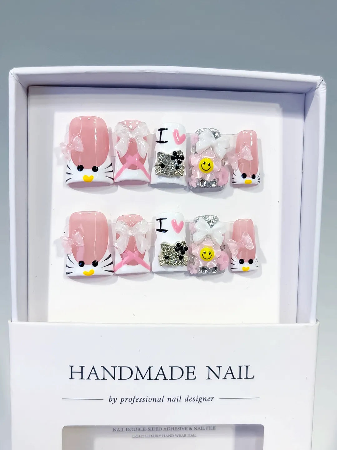 Pink White Black Silver Abstract Bow Smile Text Hello Kitty Rhinestone 3D press on nails full set view