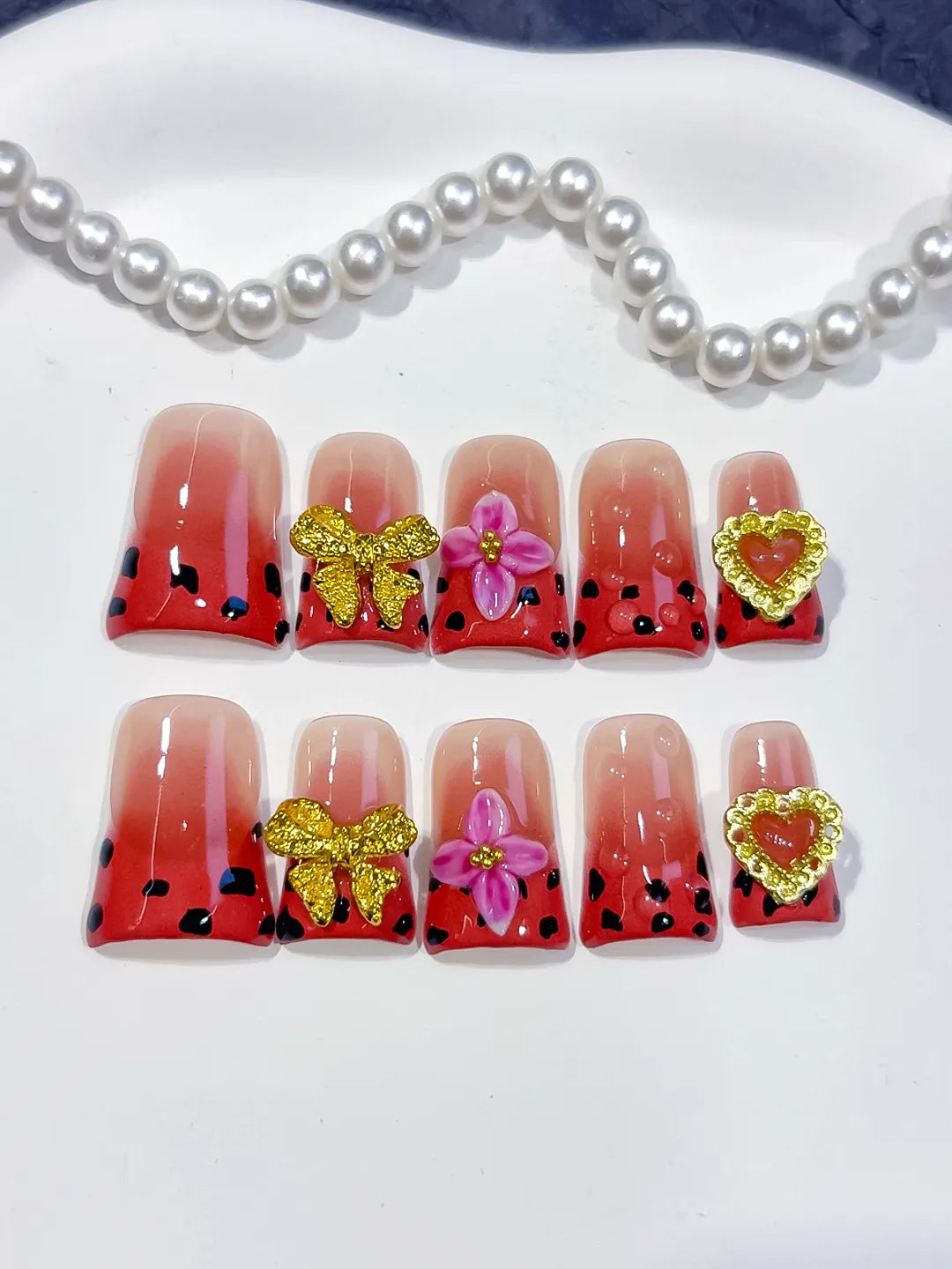 Nude Red Black Gold Abstract Bow Flower Heart press on nails detail view