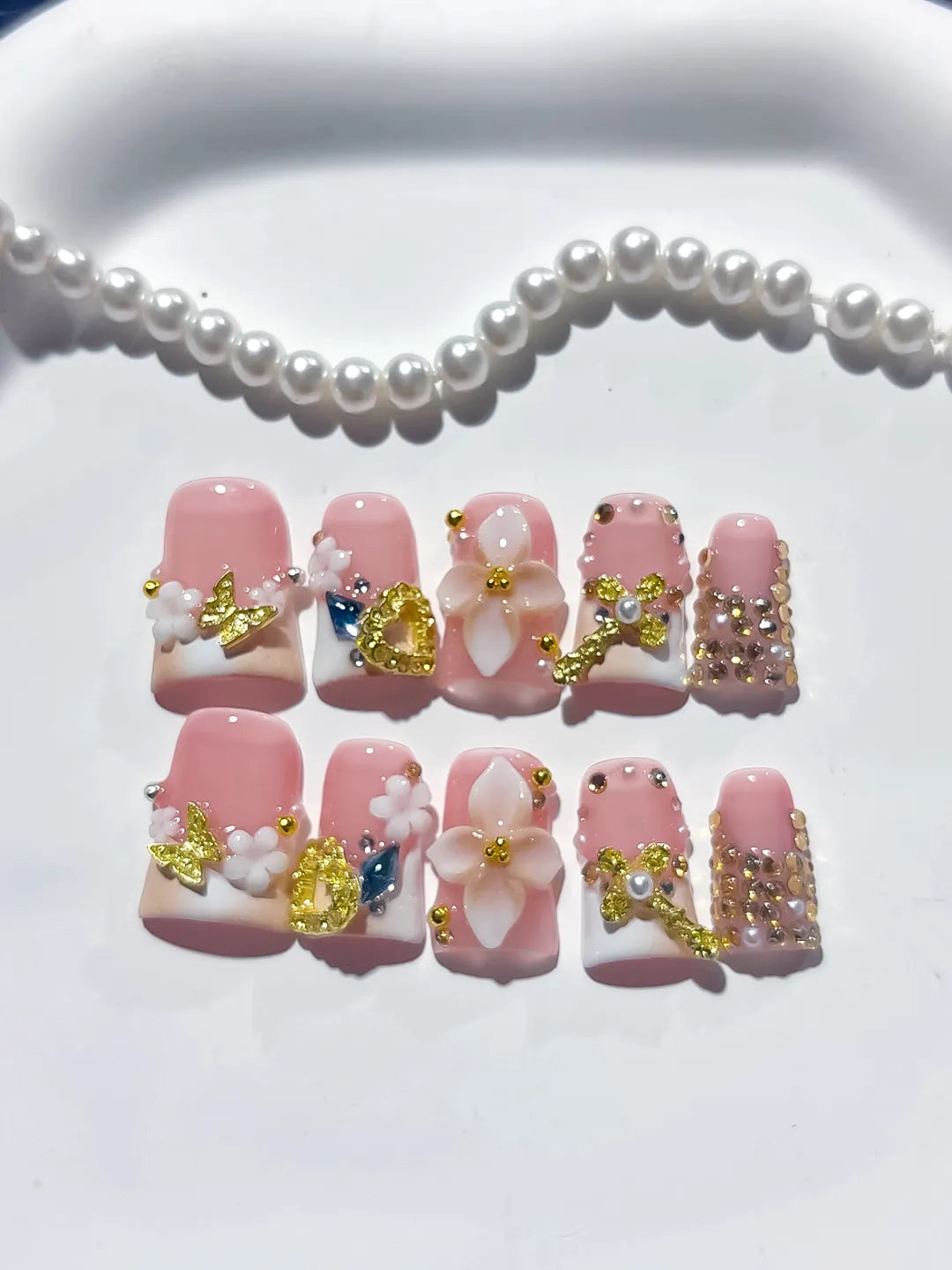Pink White Gold Blue Abstract Flower Butterfly Heart Rhinestone press on nails detail view