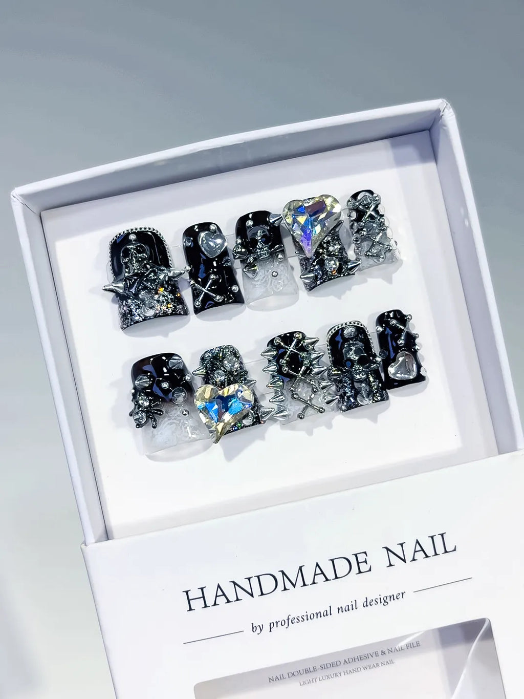 Black Silver White Glitter Heart Star Cross Skull 3D press on nails angled view