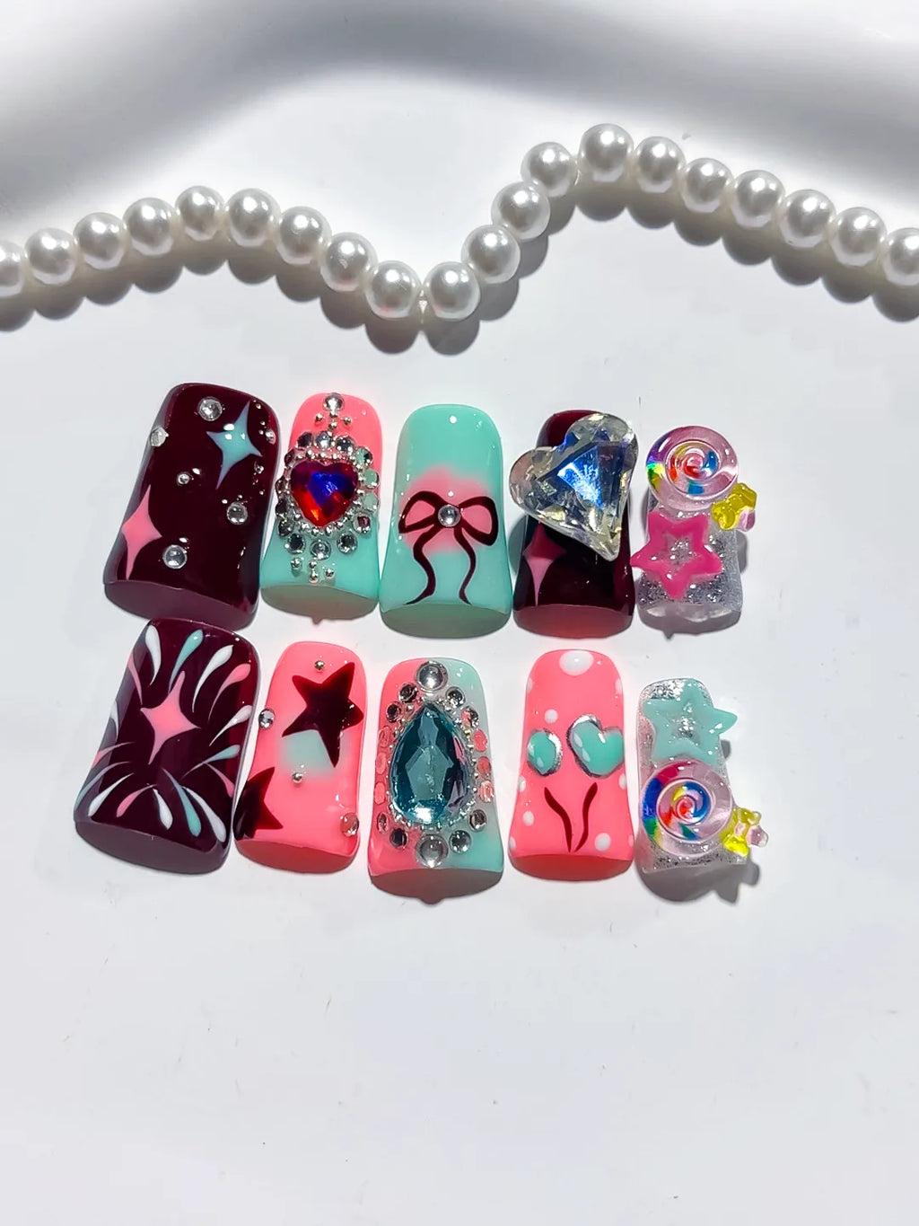 Red Pink Blue Silver Abstract Heart Bow Star Lollipop Rhinestone 3D press on nails detail view