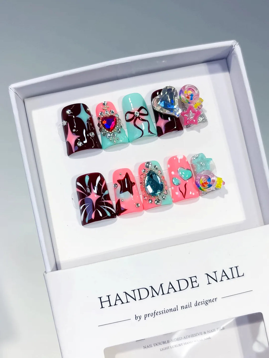 Red Pink Blue Silver Abstract Heart Bow Star Lollipop Rhinestone 3D press on nails angled view