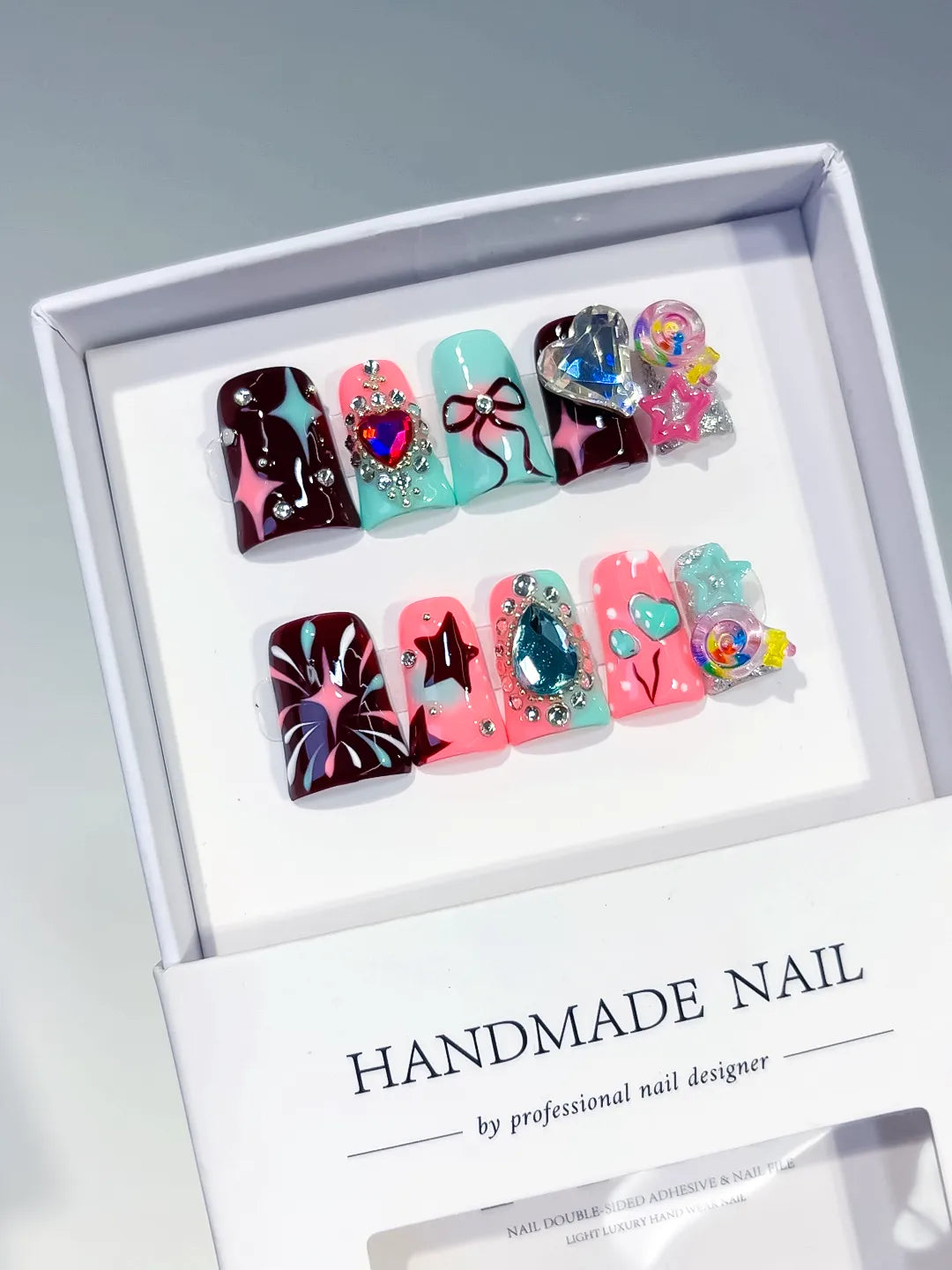 Red Pink Blue Silver Abstract Heart Bow Star Lollipop Rhinestone 3D press on nails angled view