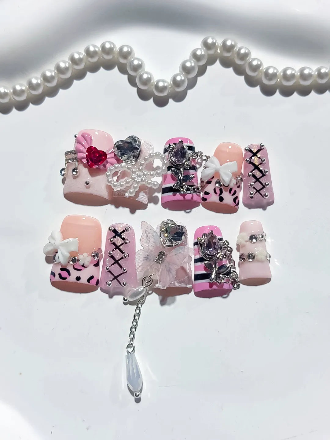 Pink White Black Silver Abstract Bow Heart Cross Lattice Chain Rhinestone 3D press on nails detail view