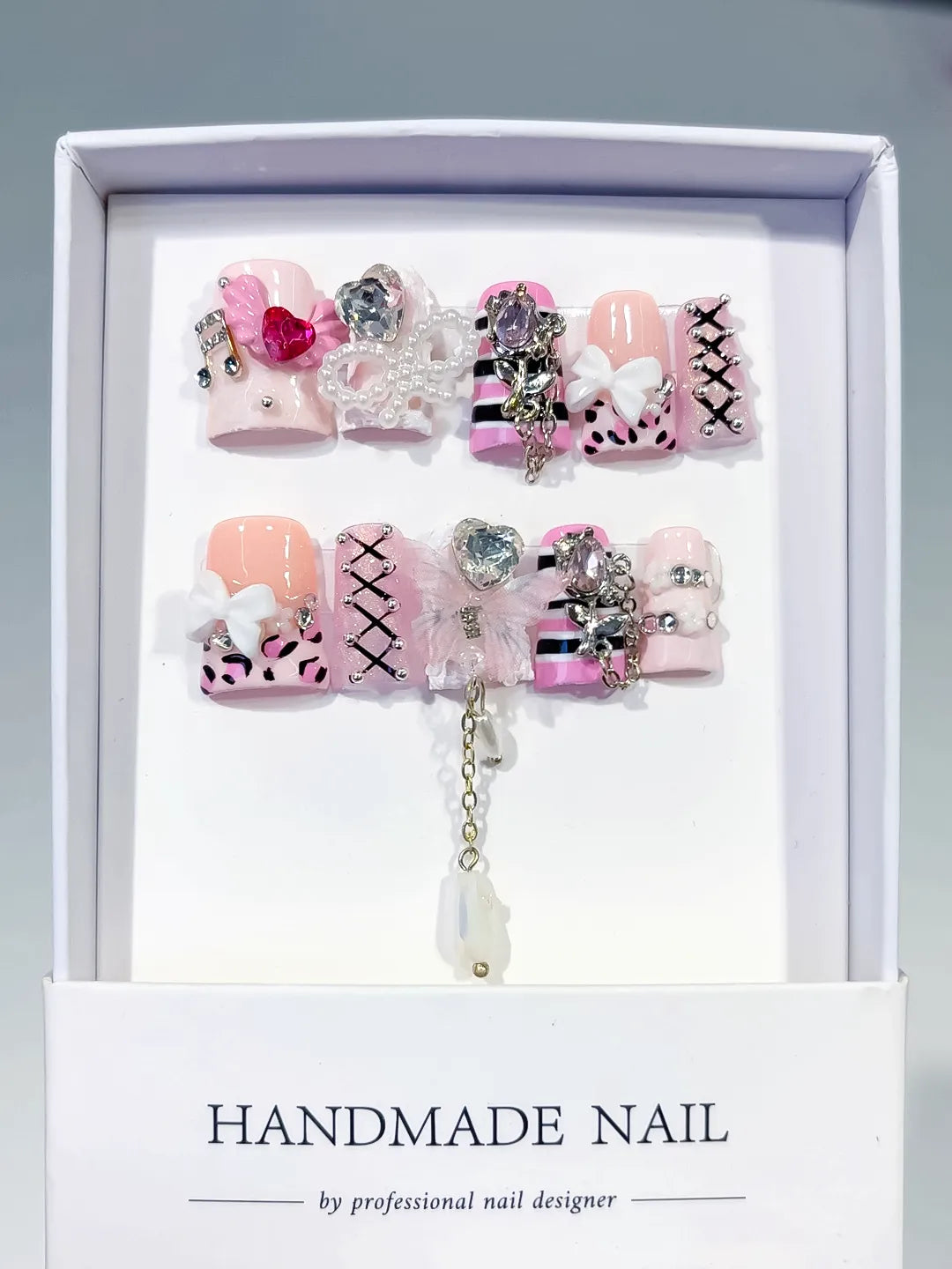 Pink White Black Silver Abstract Bow Heart Cross Lattice Chain Rhinestone 3D press on nails full set view