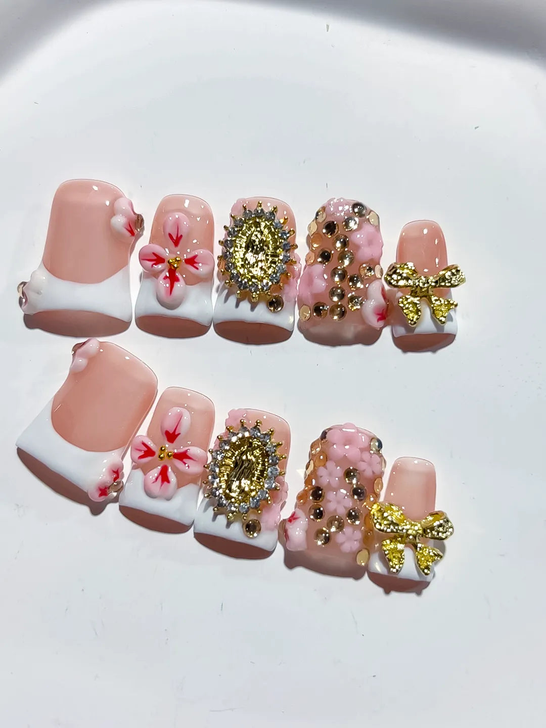 Nude White Pink Gold French tip Flower Bow Rhinestone press on nails close up
