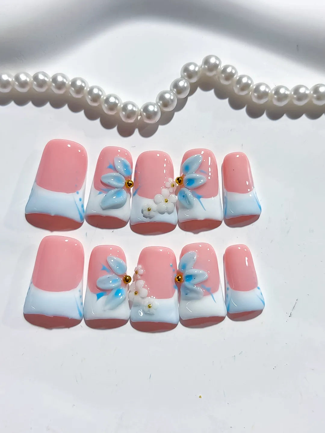 Pink White Blue French tip Flower 3D press on nails close up