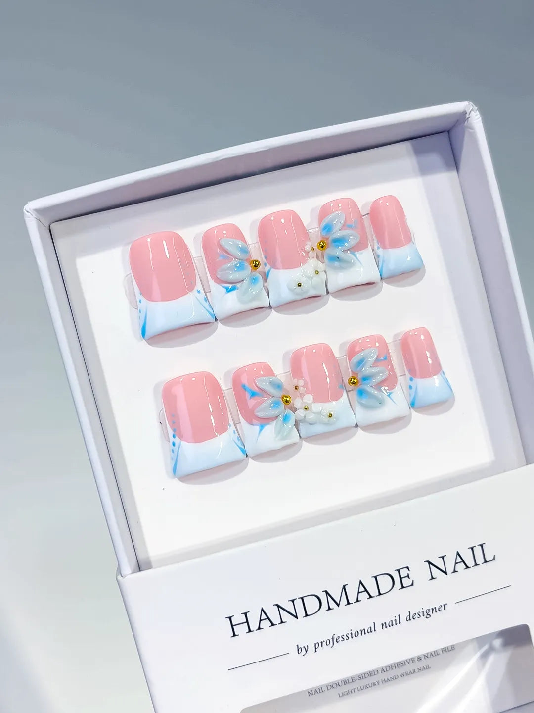 Pink White Blue French tip Flower 3D press on nails angled view