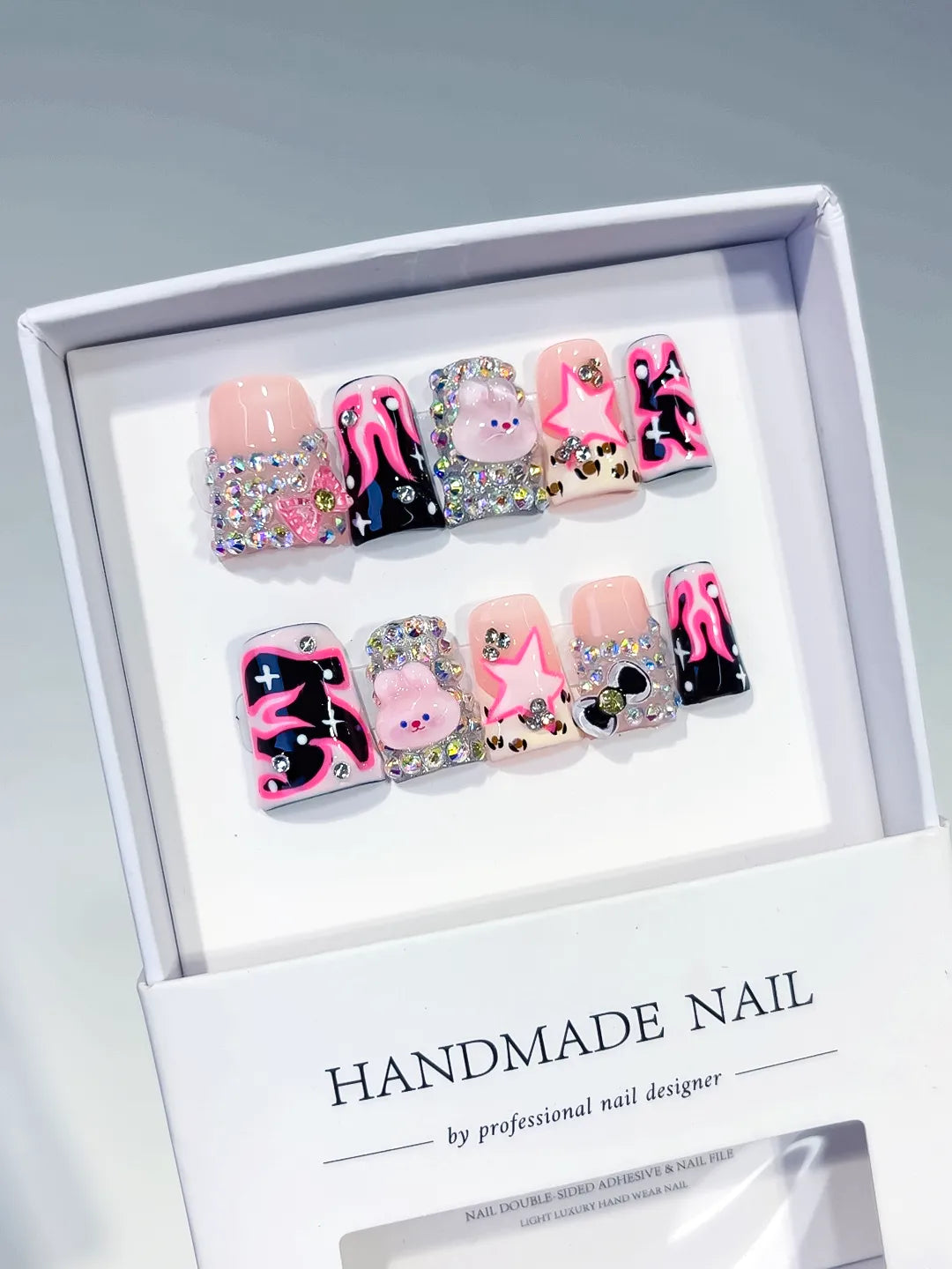Nude Pink Black Silver Multicolor Abstract Star Bear Heart Rhinestone 3D press on nails angled view