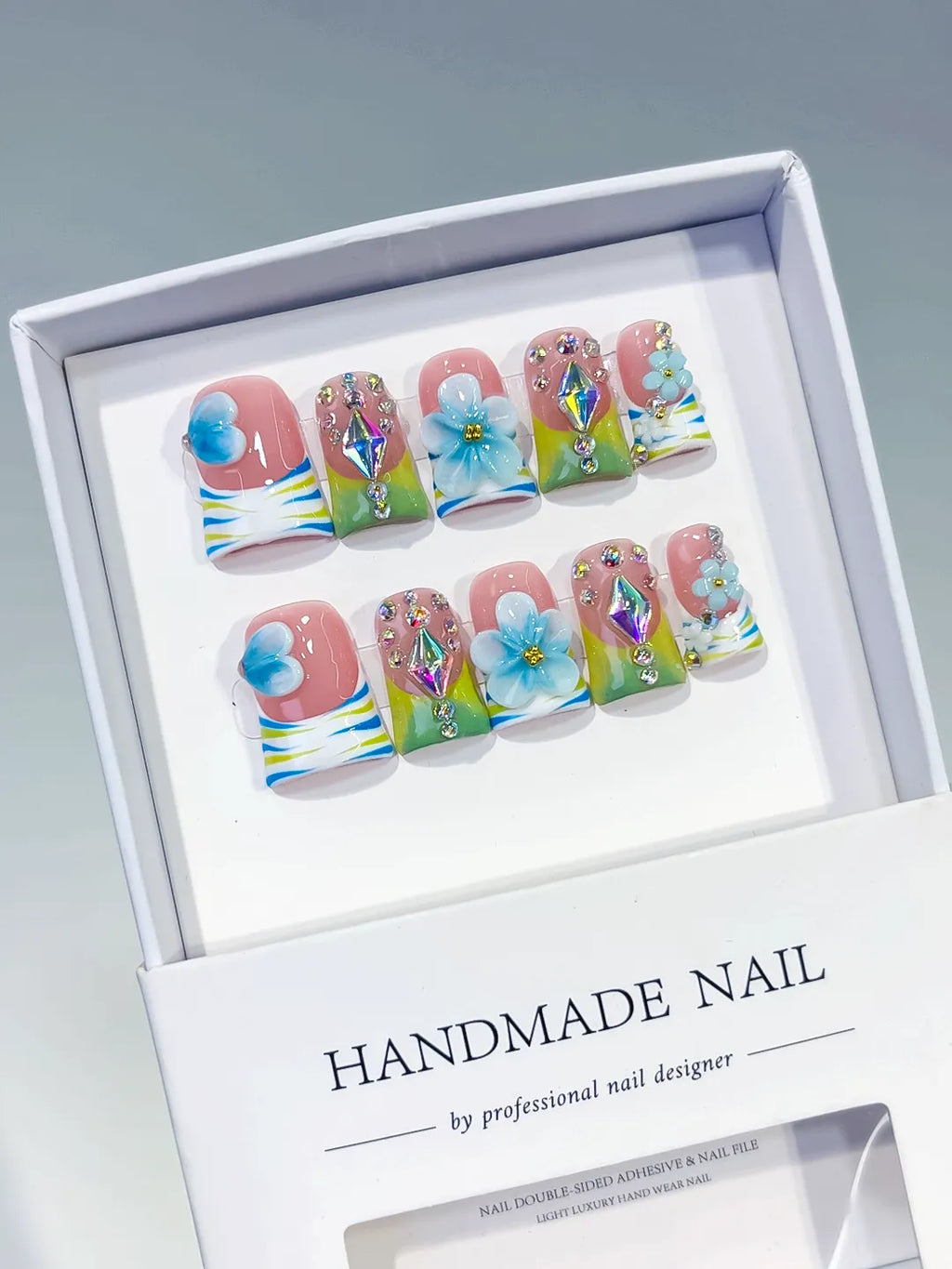 Nude Blue Green Yellow Silver Abstract Flower Rhinestone 3D press on nails angled view