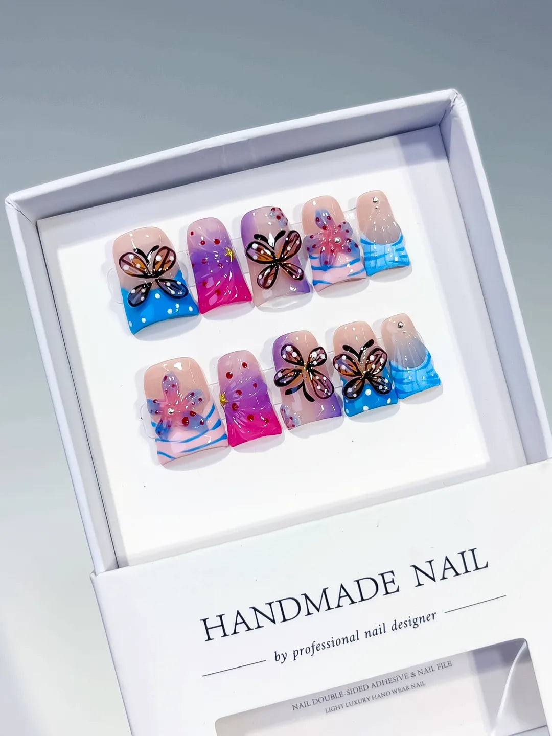 Pink Blue Purple Silver Abstract Butterfly Flower Rhinestone 3D press on nails angled view