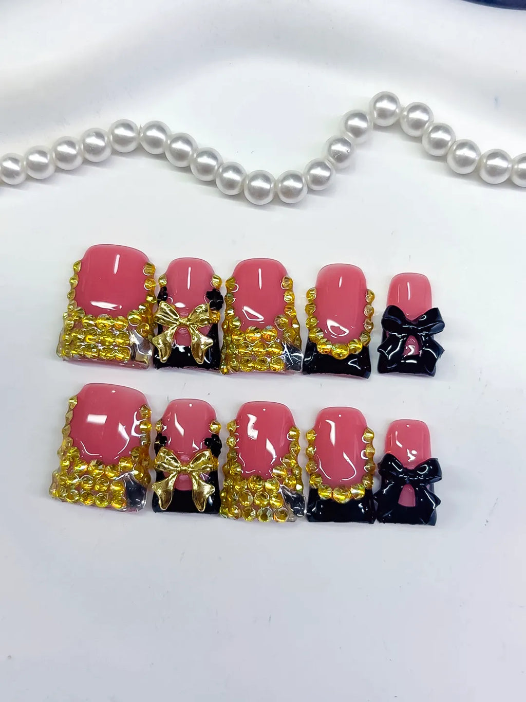 Pink Black Gold French tip Bow Rhinestone press on nails detail view
