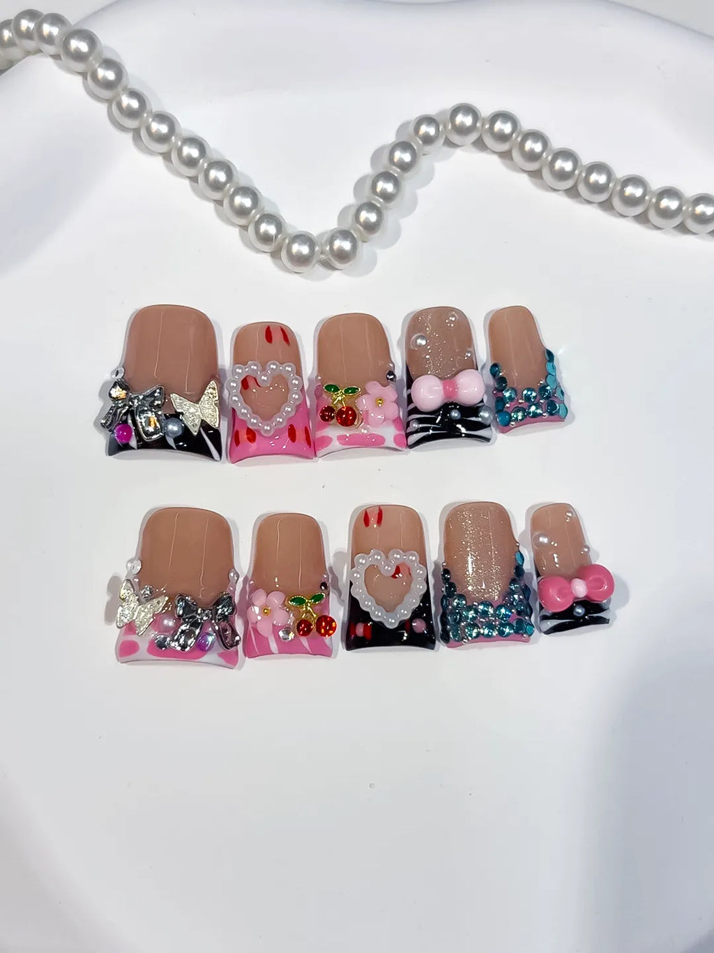 Nude Pink Black Blue Silver Abstract Heart Flower Cherry Rhinestone 3D press on nails detail view