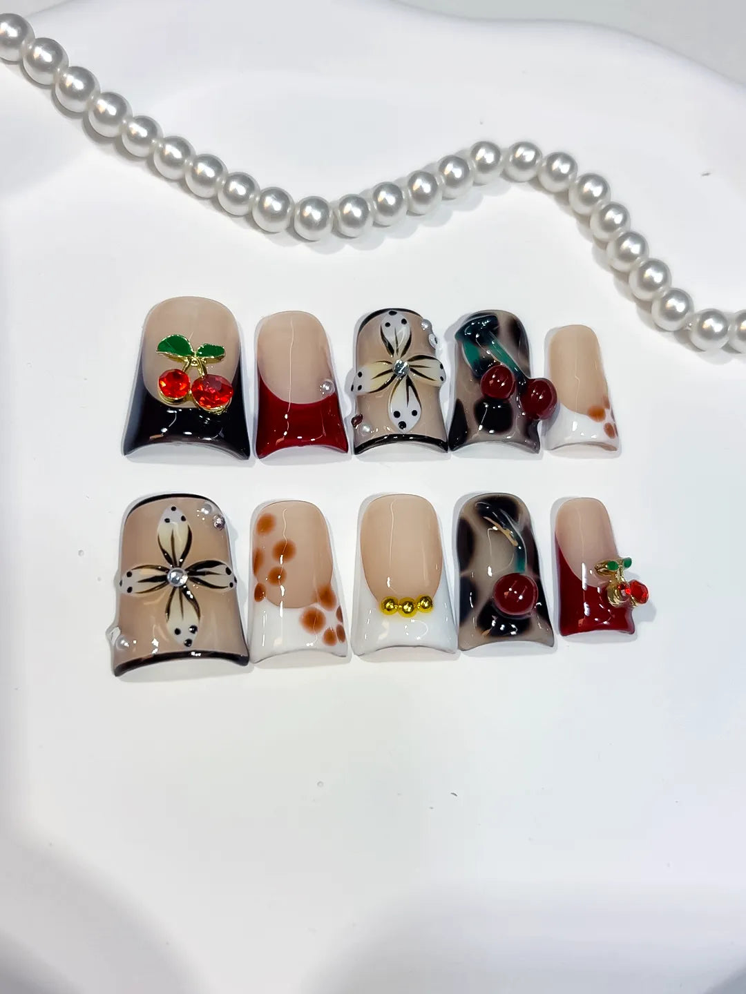 Nude White Black Red Gold Abstract Flower Cherry press on nails detail view