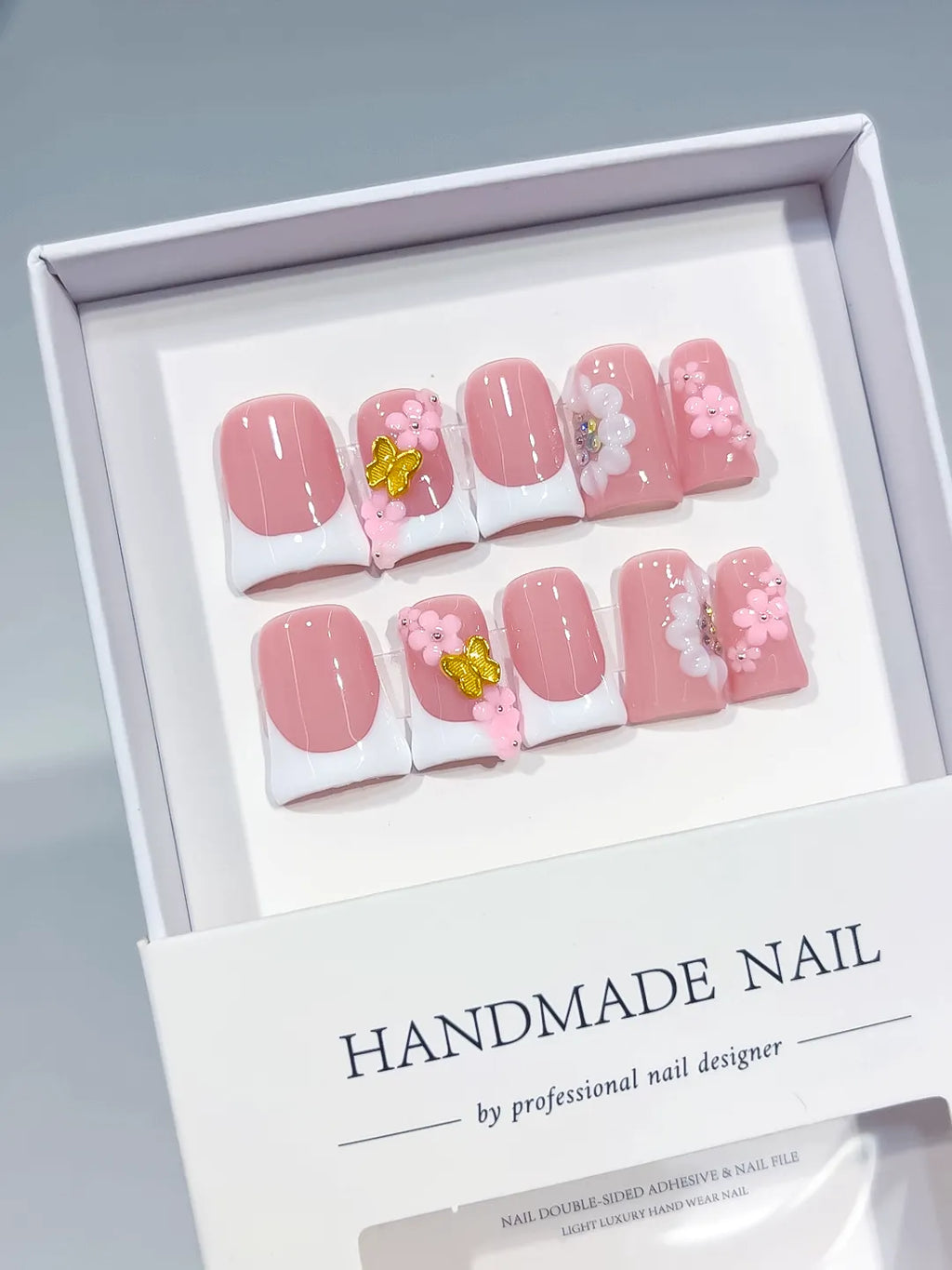 Pink White French tip Flower 3D press on nails angled view