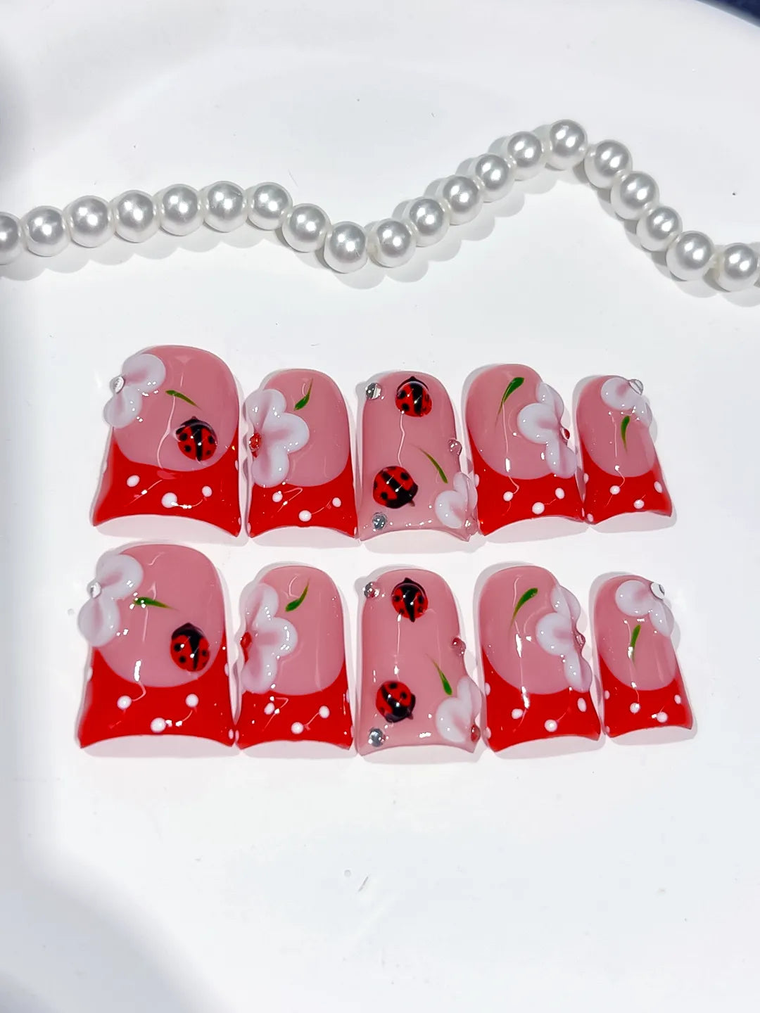 Pink Red White Abstract Ladybug Flower 3D press on nails detail view